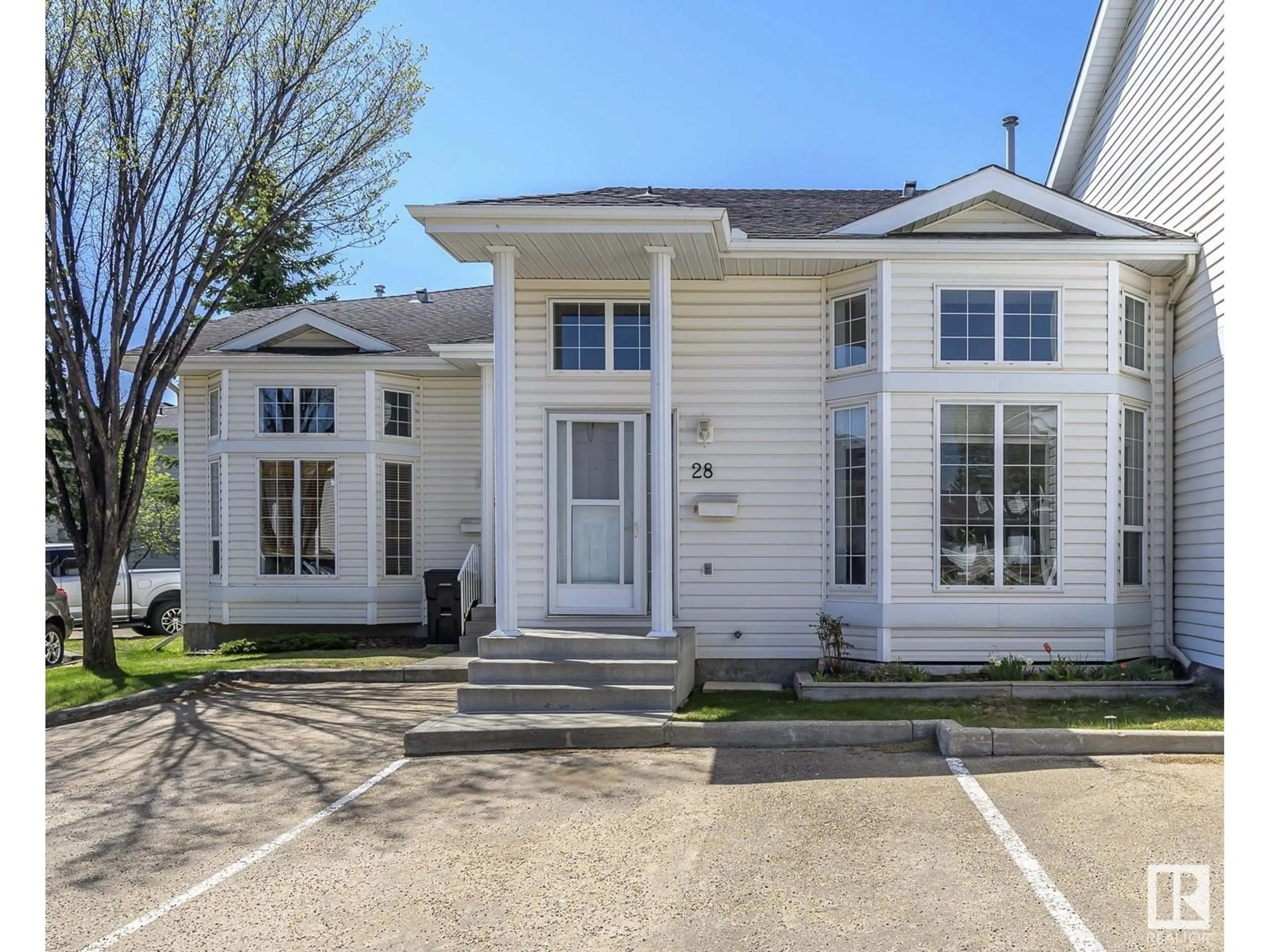 Home with vinyl exterior material, street for 3380 - 28 28A AV, Edmonton Alberta T6T1V4