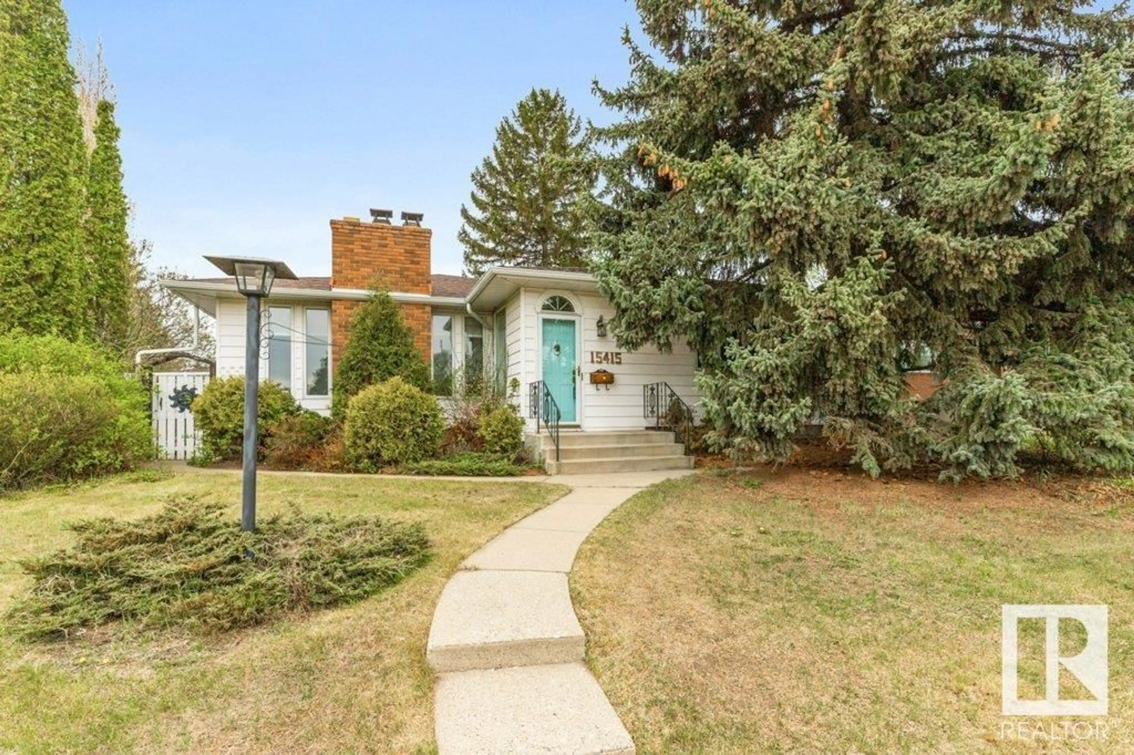 Home with brick exterior material, street for NW - 15415 80 AV, Edmonton Alberta T5R3M1