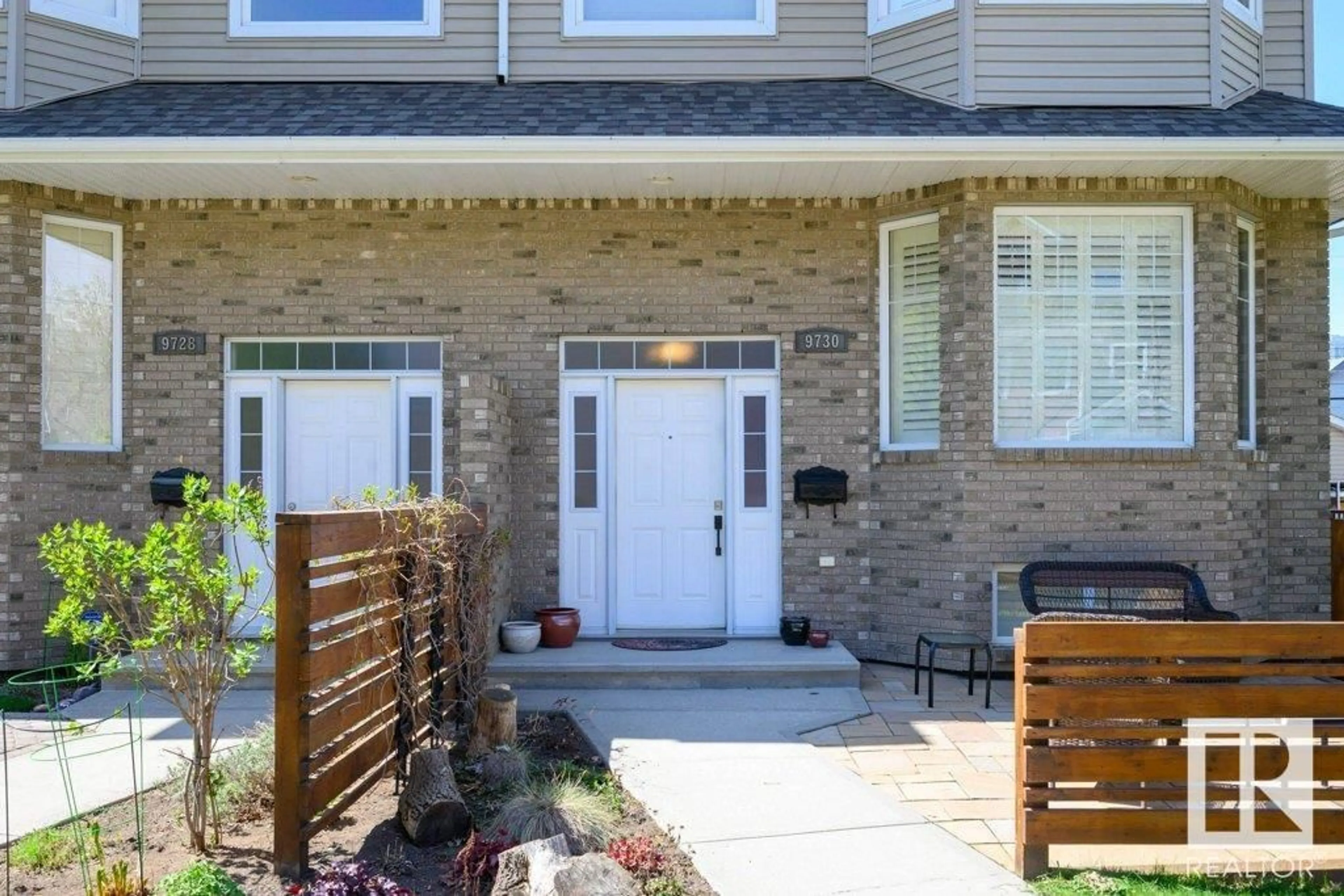 Home with brick exterior material, street for 9730 92 ST, Edmonton Alberta T6C3S4