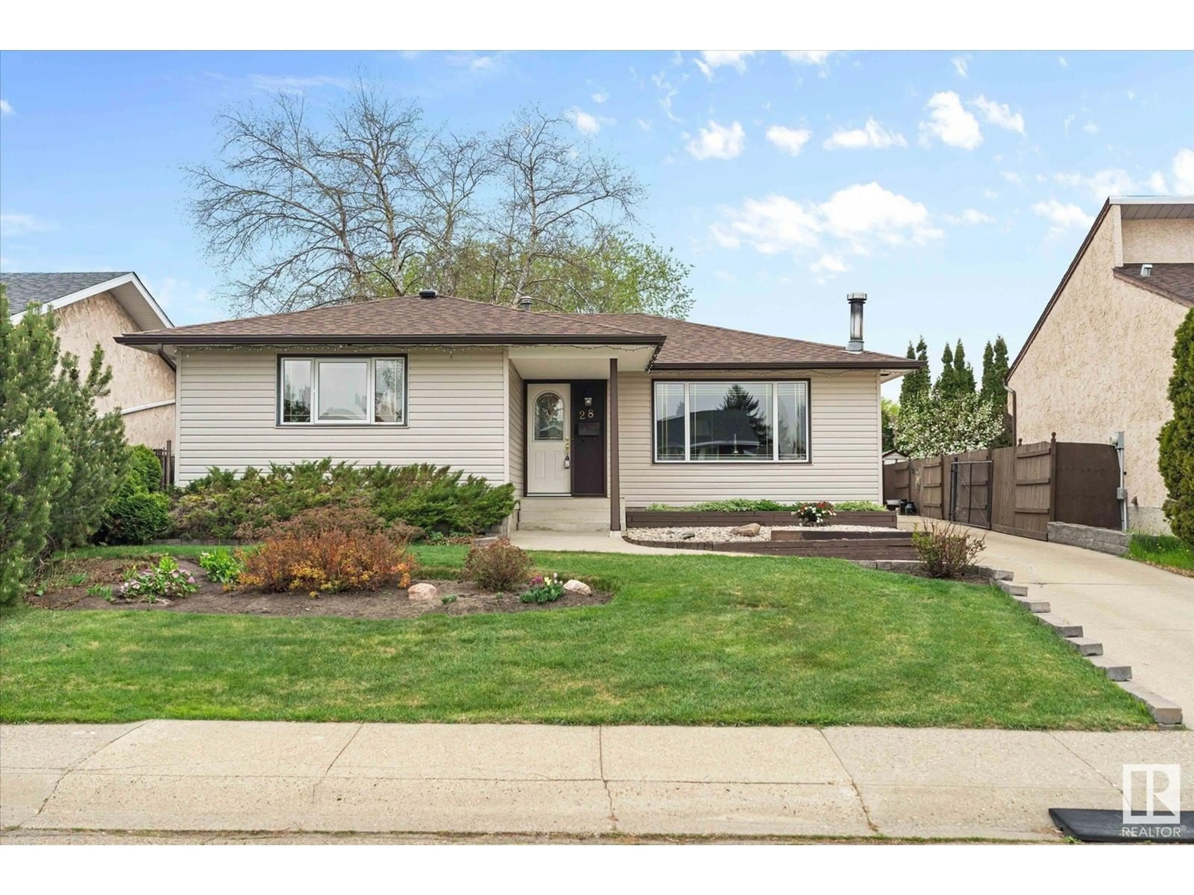 Home with vinyl exterior material, street for 28 HUGHES RD, Edmonton Alberta T5A4E2