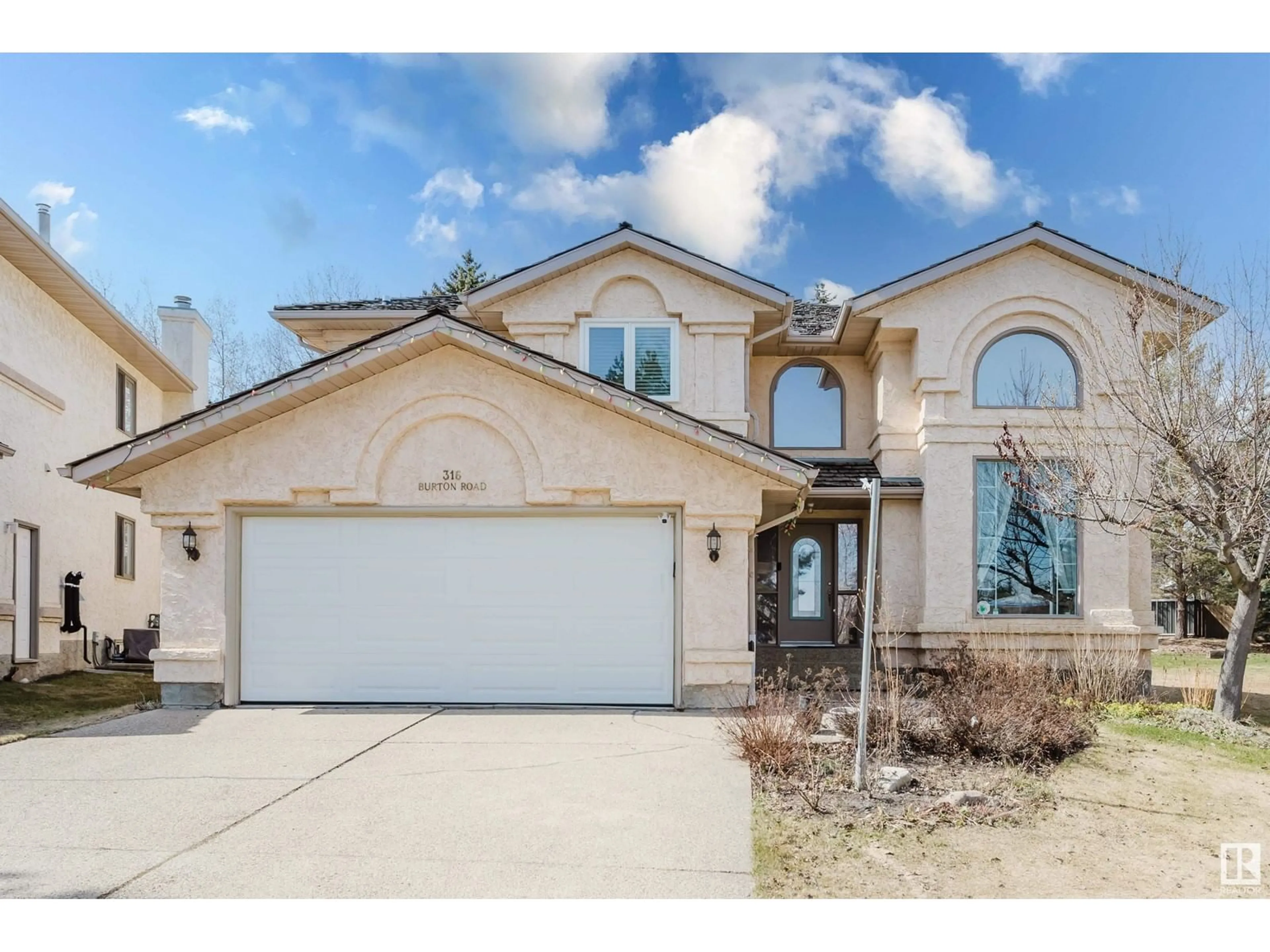Home with brick exterior material, street for 316 BURTON RD, Edmonton Alberta T6R2G7