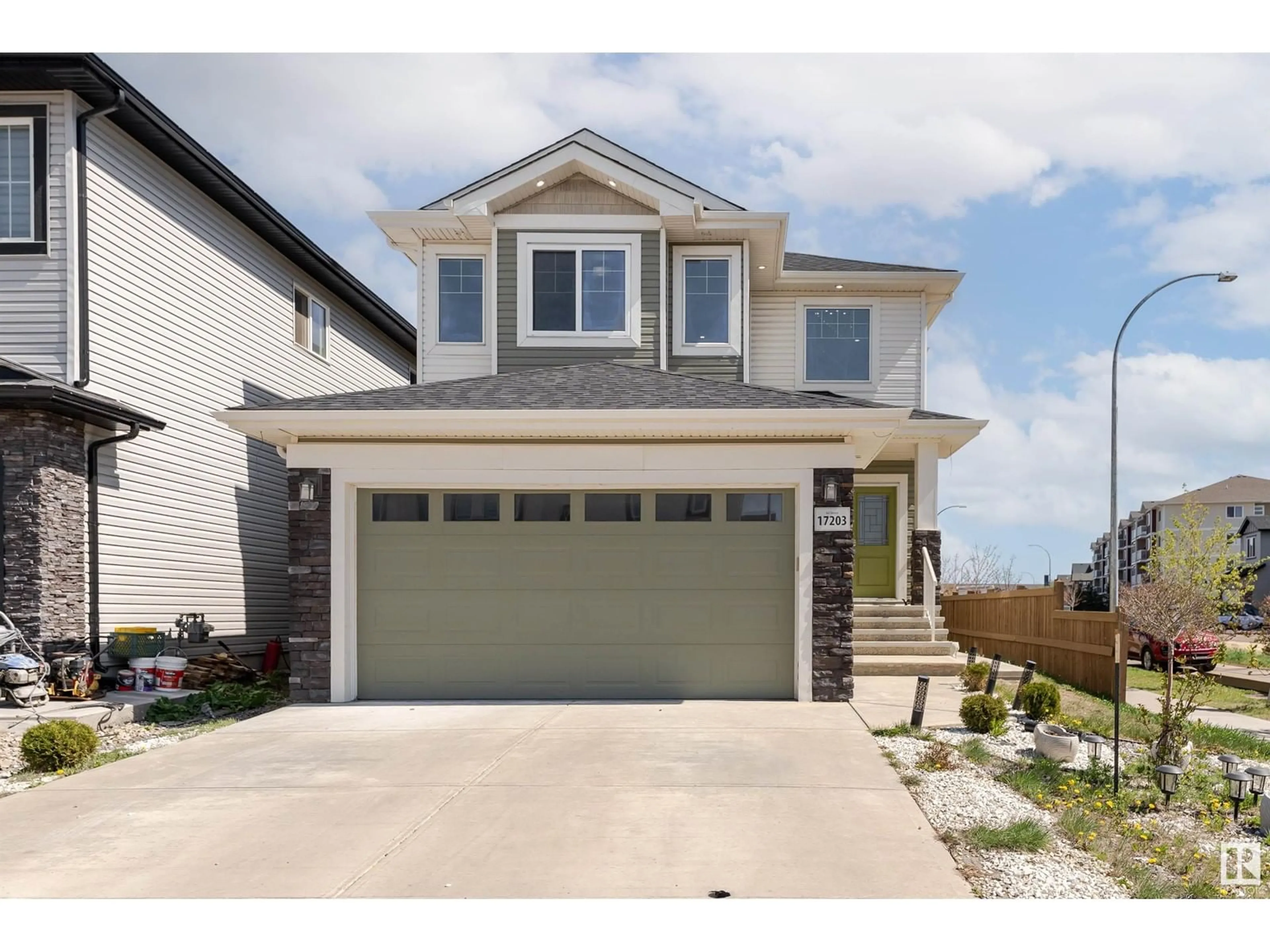 Home with vinyl exterior material, street for NW - 17203 62 ST, Edmonton Alberta T5Y3V5
