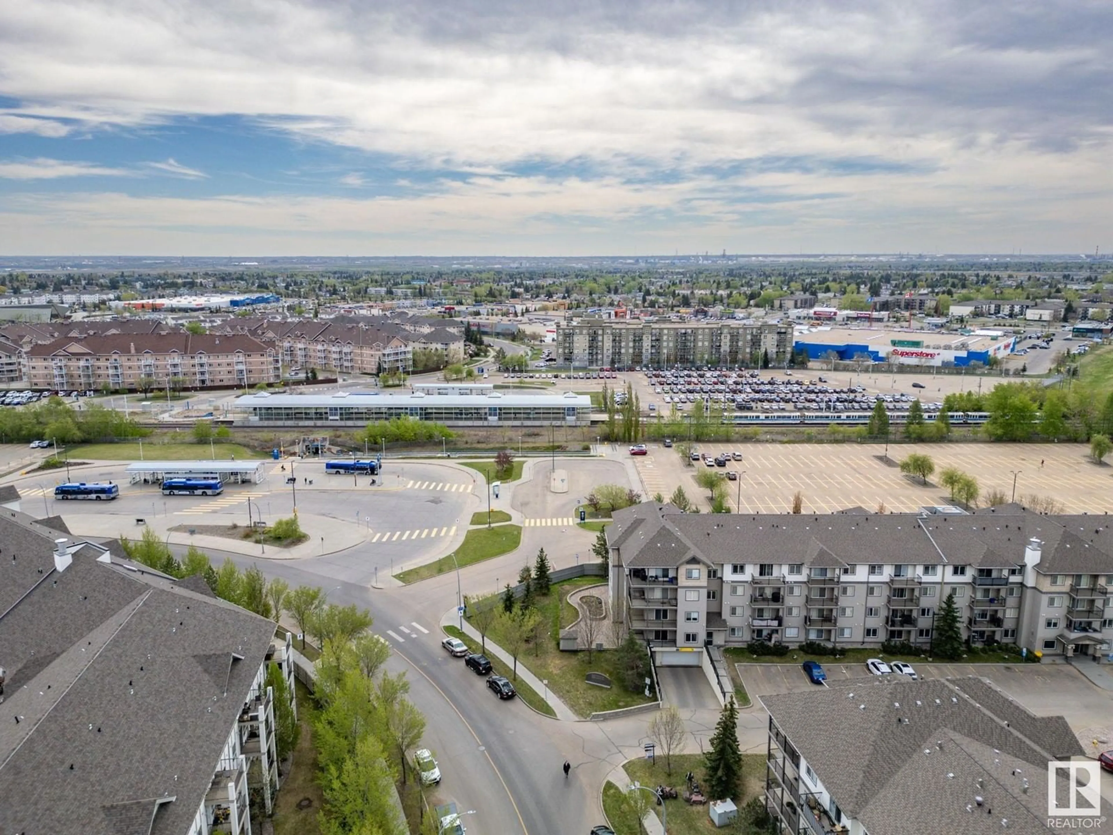 A pic from outside/outdoor area/front of a property/back of a property/a pic from drone, unknown for #407 - 309 CLAREVIEW STATION DR, Edmonton Alberta T5Y0C5