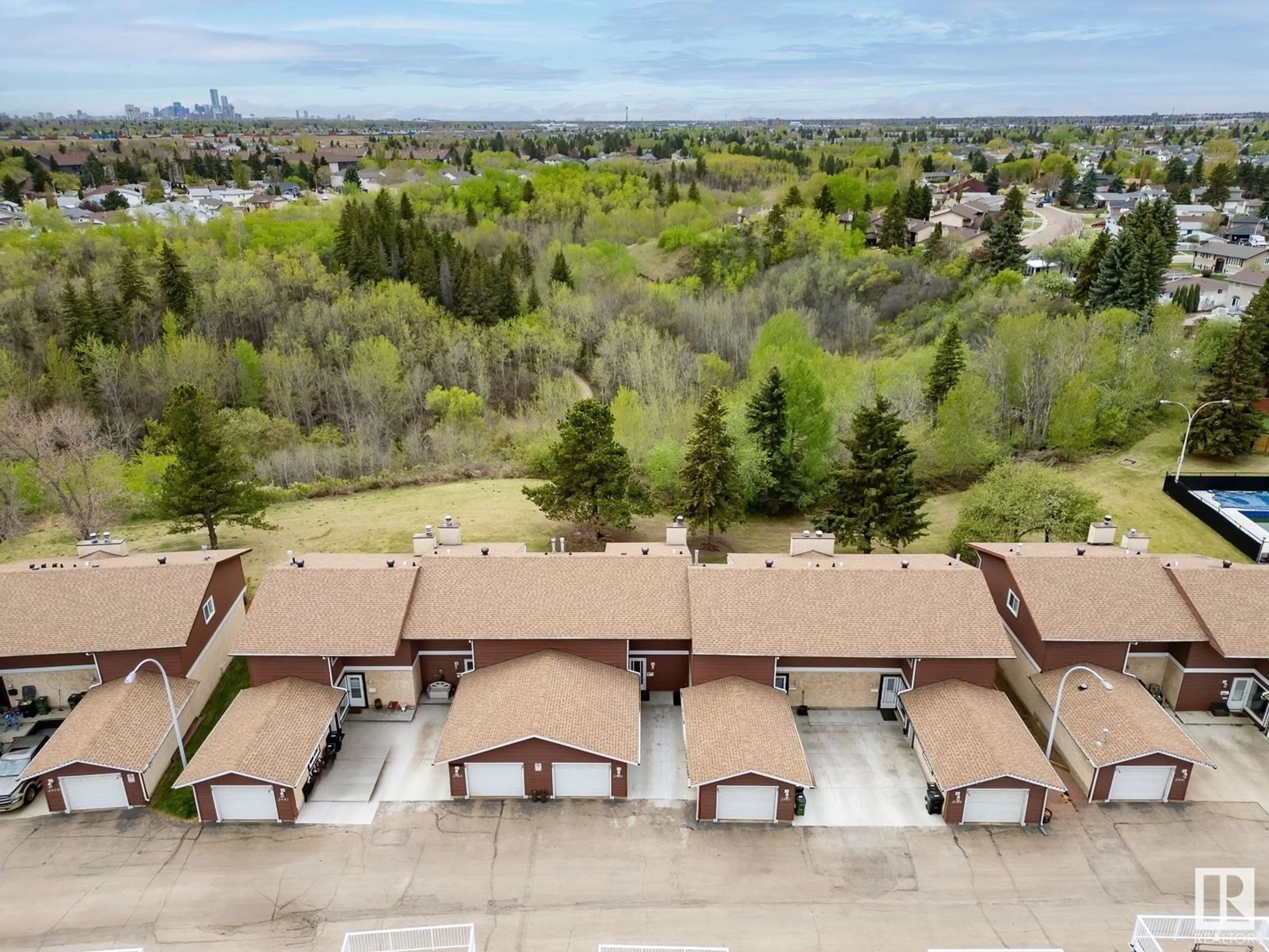 A pic from outside/outdoor area/front of a property/back of a property/a pic from drone, unknown for 2985 130 AV, Edmonton Alberta T5A3M1