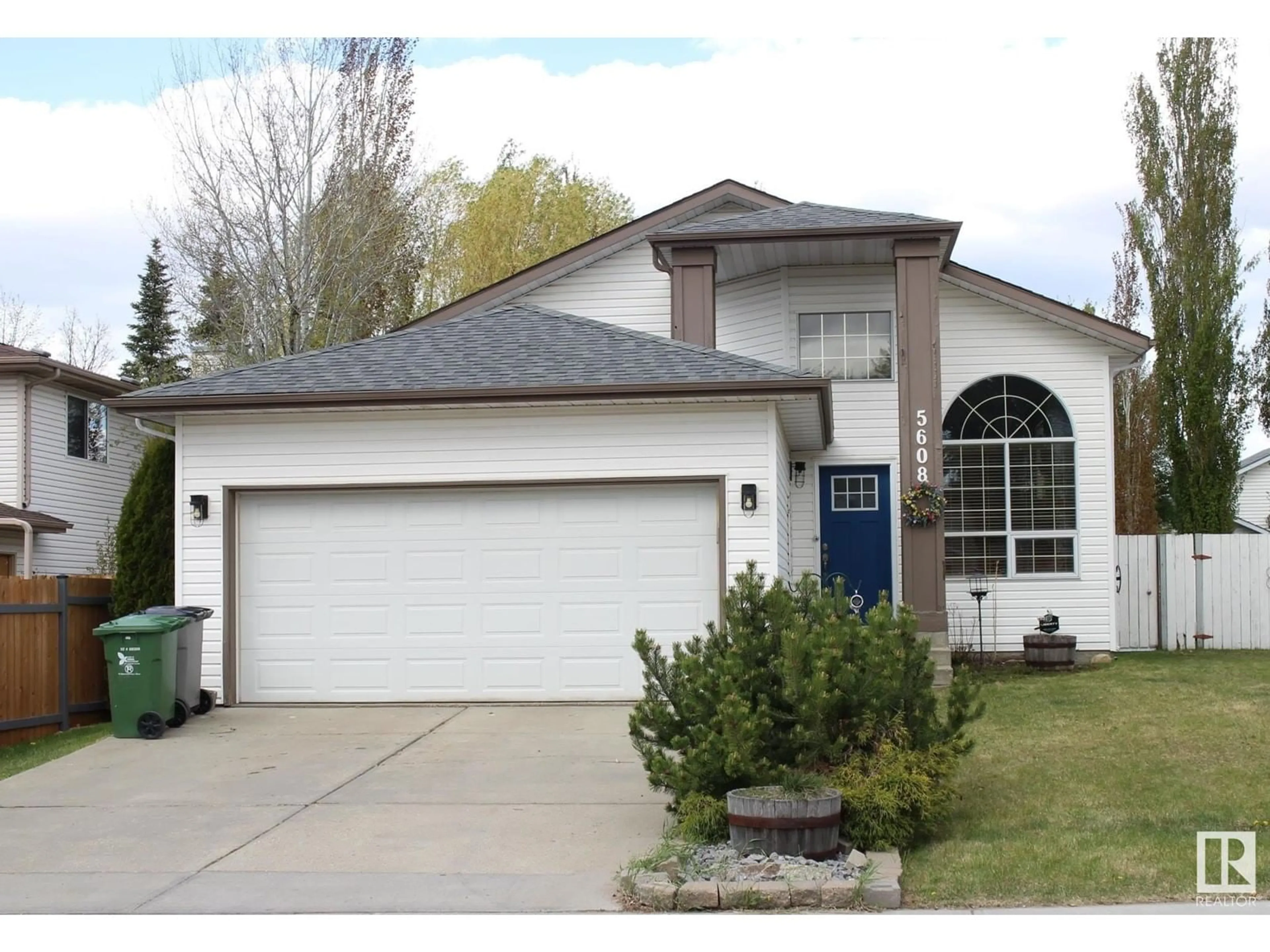 Home with vinyl exterior material, street for 5608 56 AV, Beaumont Alberta T4X1A6