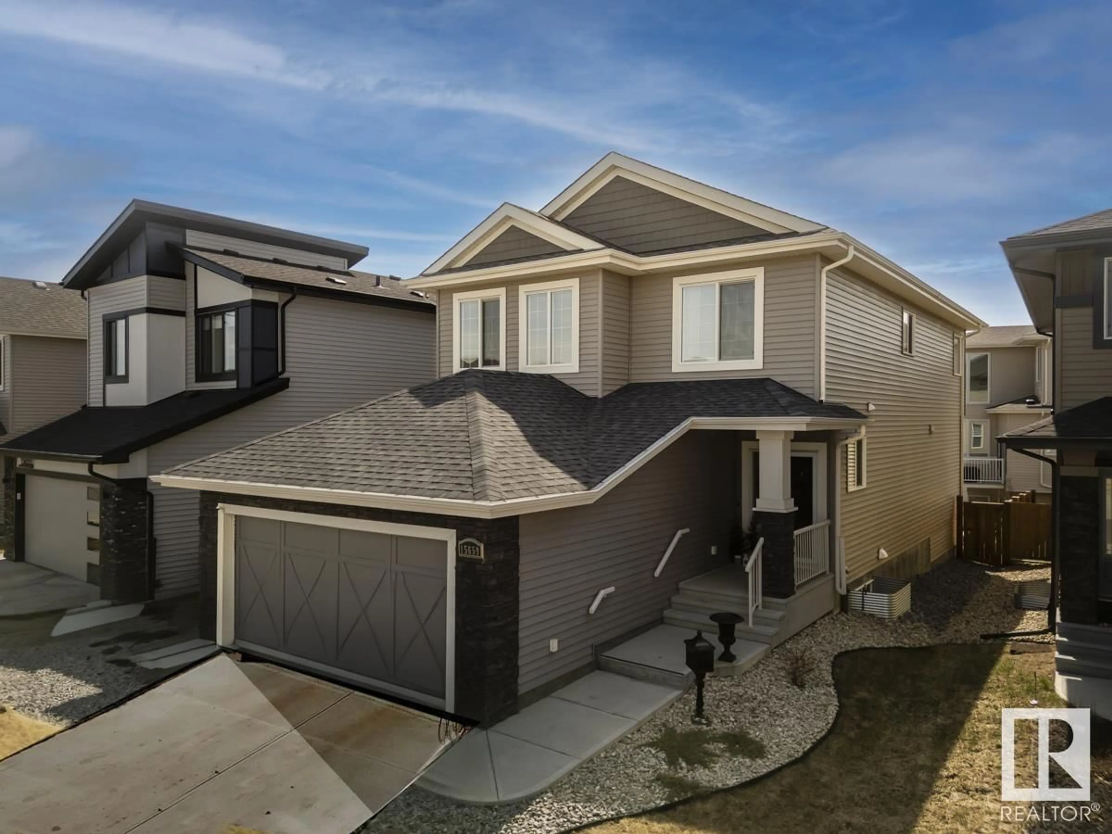 Home with vinyl exterior material, street for SW - 15659 16 AV, Edmonton Alberta T6W4S2