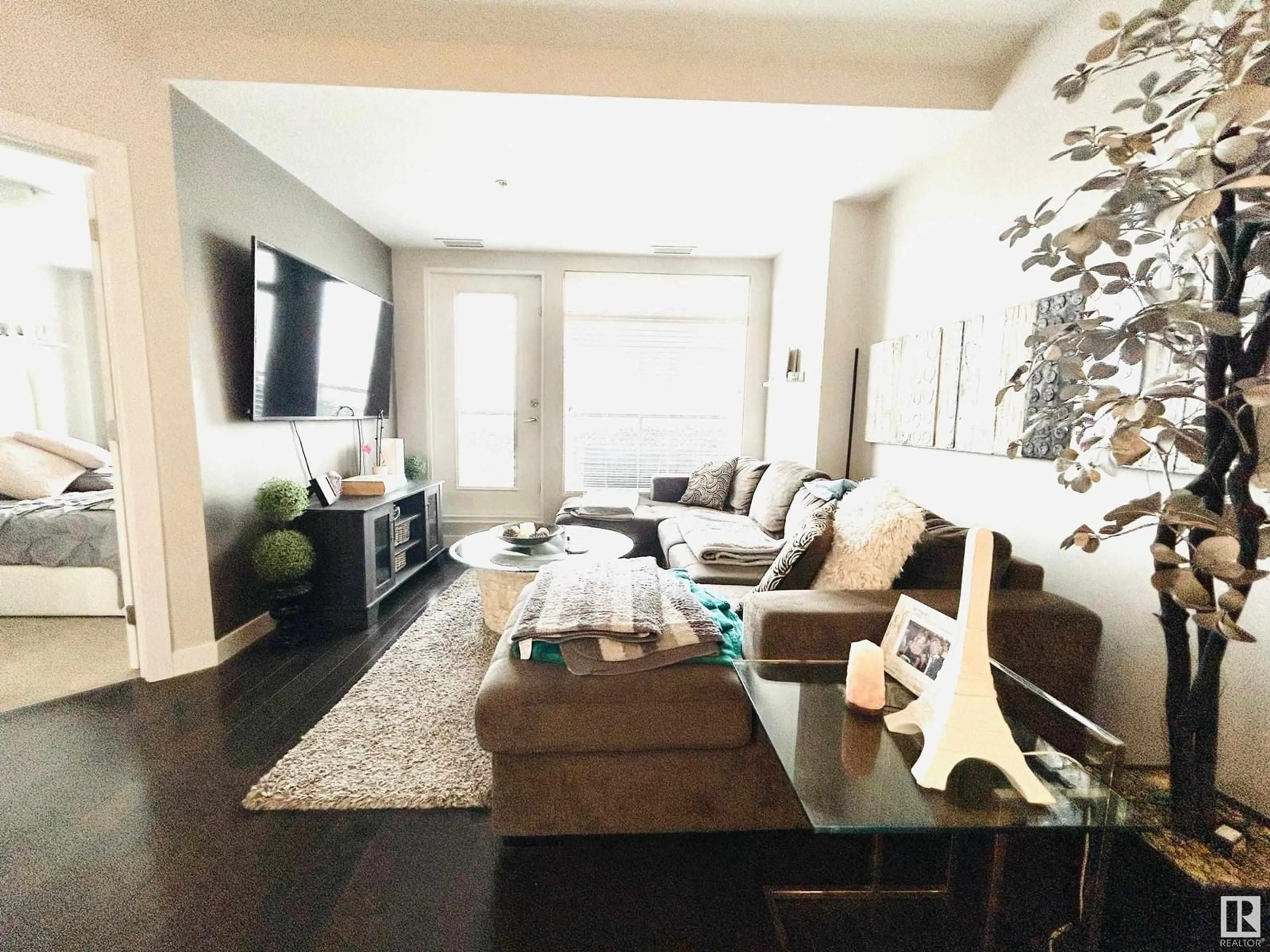 Living room with furniture, unknown for 5151 - 831 WINDERMERE BV, Edmonton Alberta T6W2K4