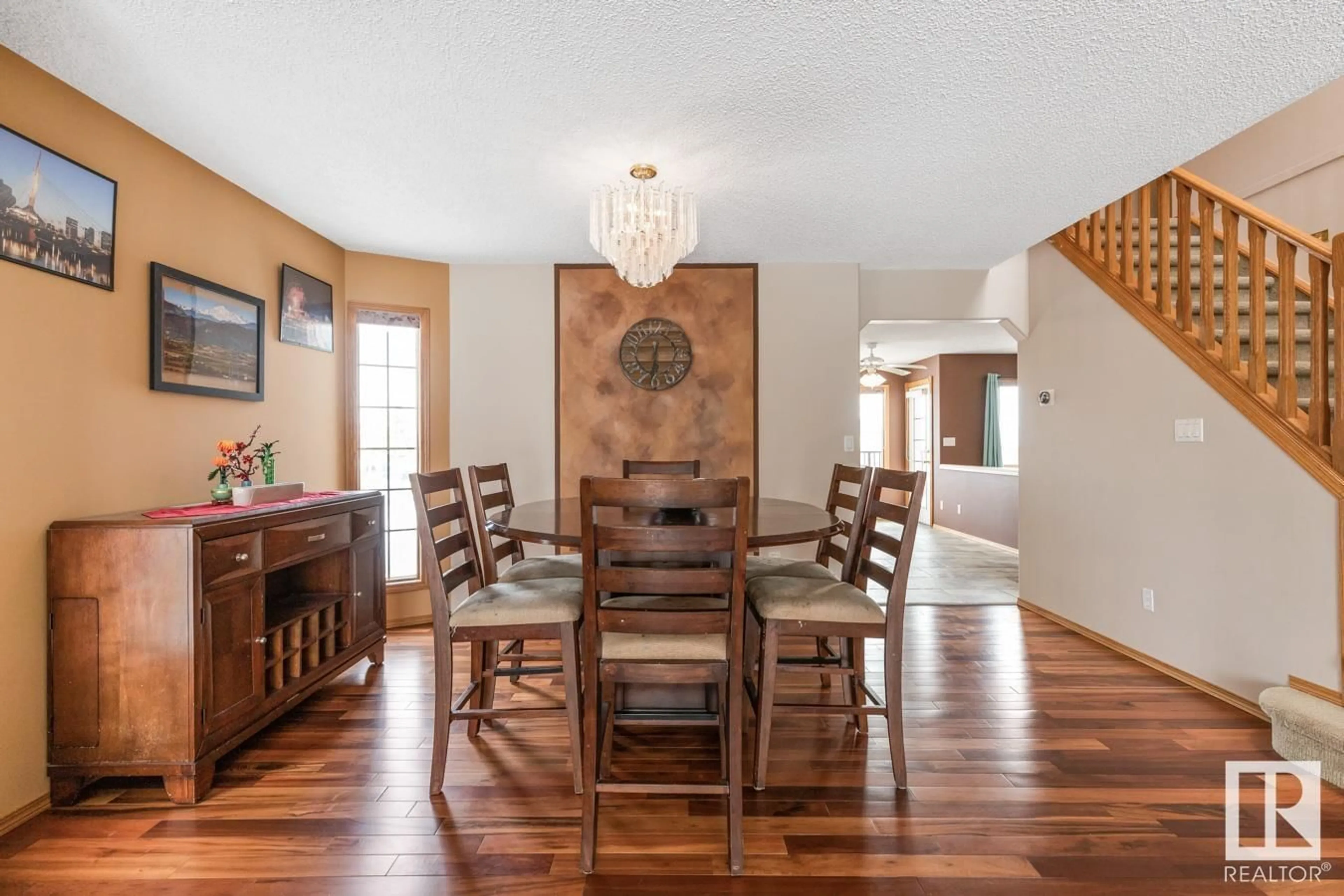 Dining room, wood/laminate floor for 408 HOLLICK-KENYON RD, Edmonton Alberta T5Y2T9