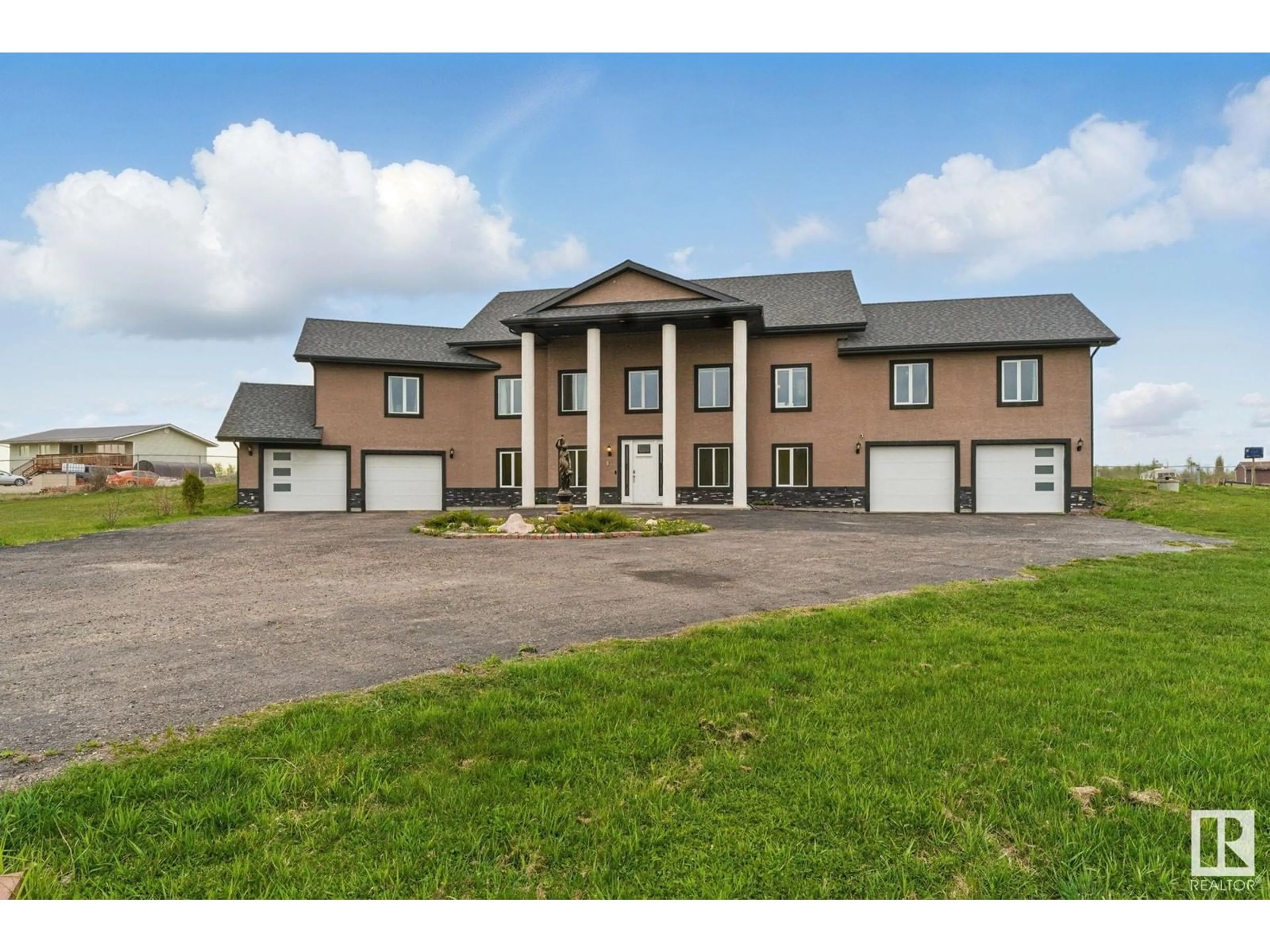 A pic from outside/outdoor area/front of a property/back of a property/a pic from drone, building for 390 50353 RGE RD 224, Rural Leduc County Alberta T0B3M1