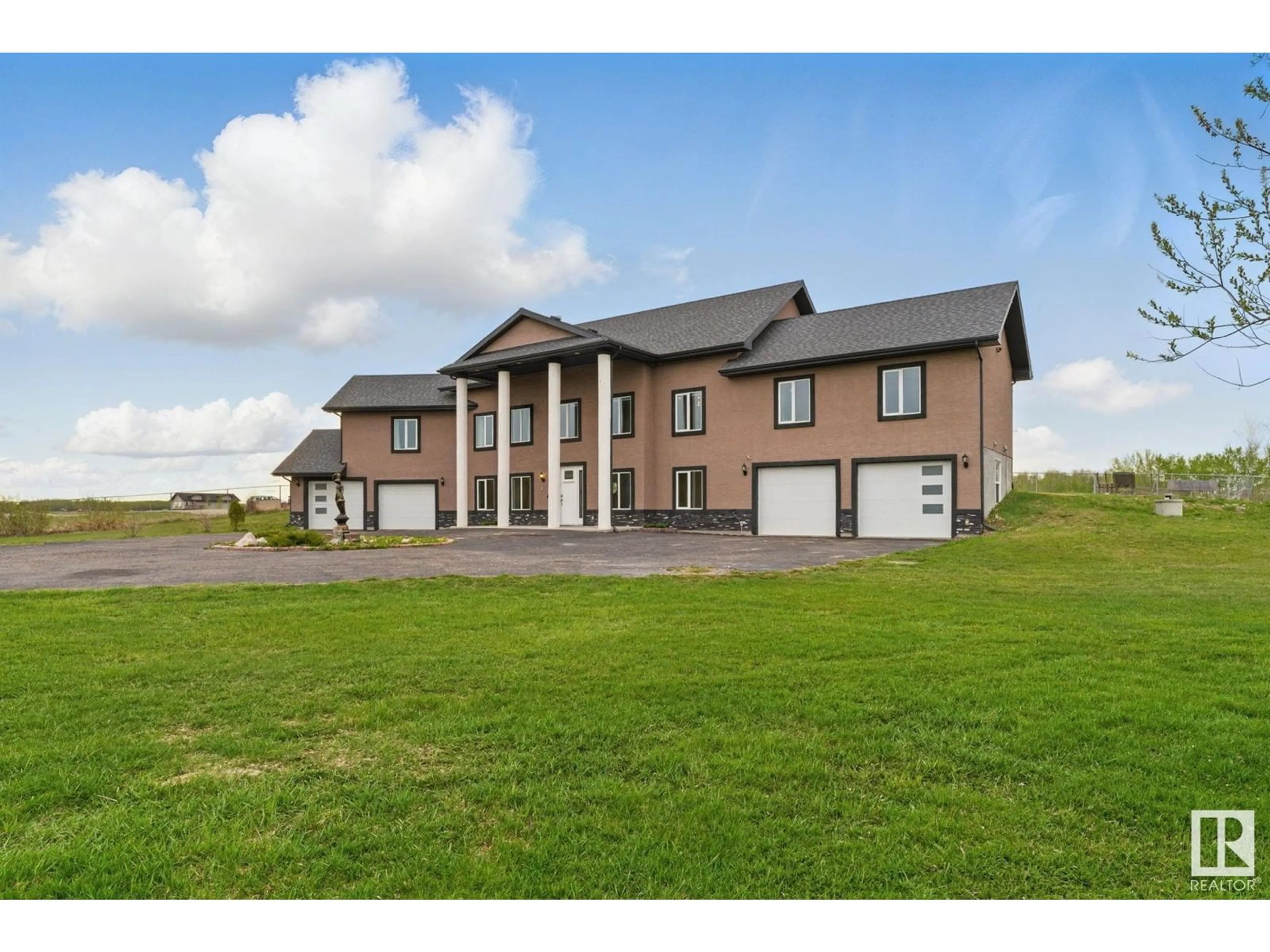 A pic from outside/outdoor area/front of a property/back of a property/a pic from drone, building for 390 50353 RGE RD 224, Rural Leduc County Alberta T0B3M1