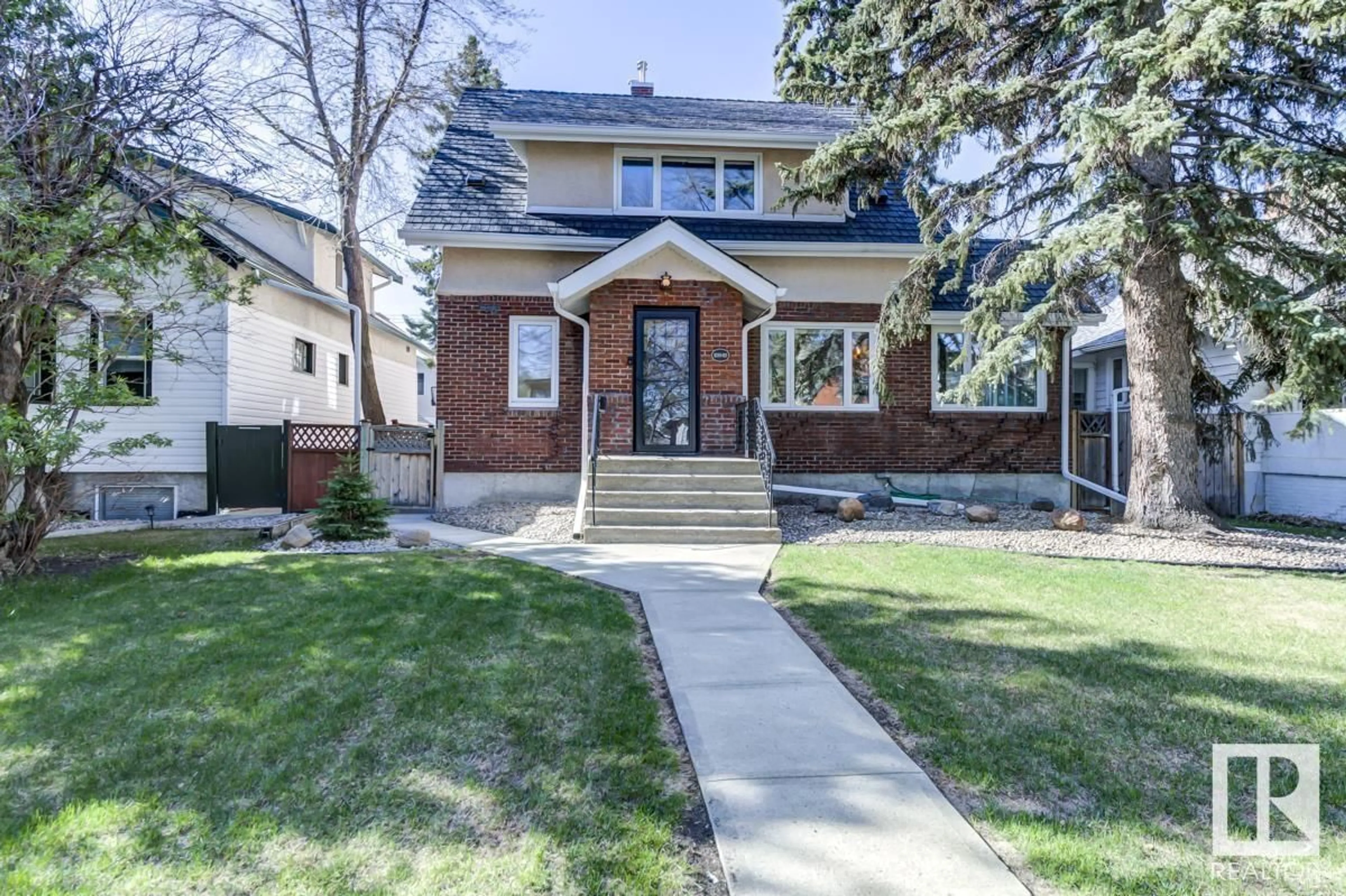 Home with brick exterior material, street for 10949 88 AV, Edmonton Alberta T6G0Y9