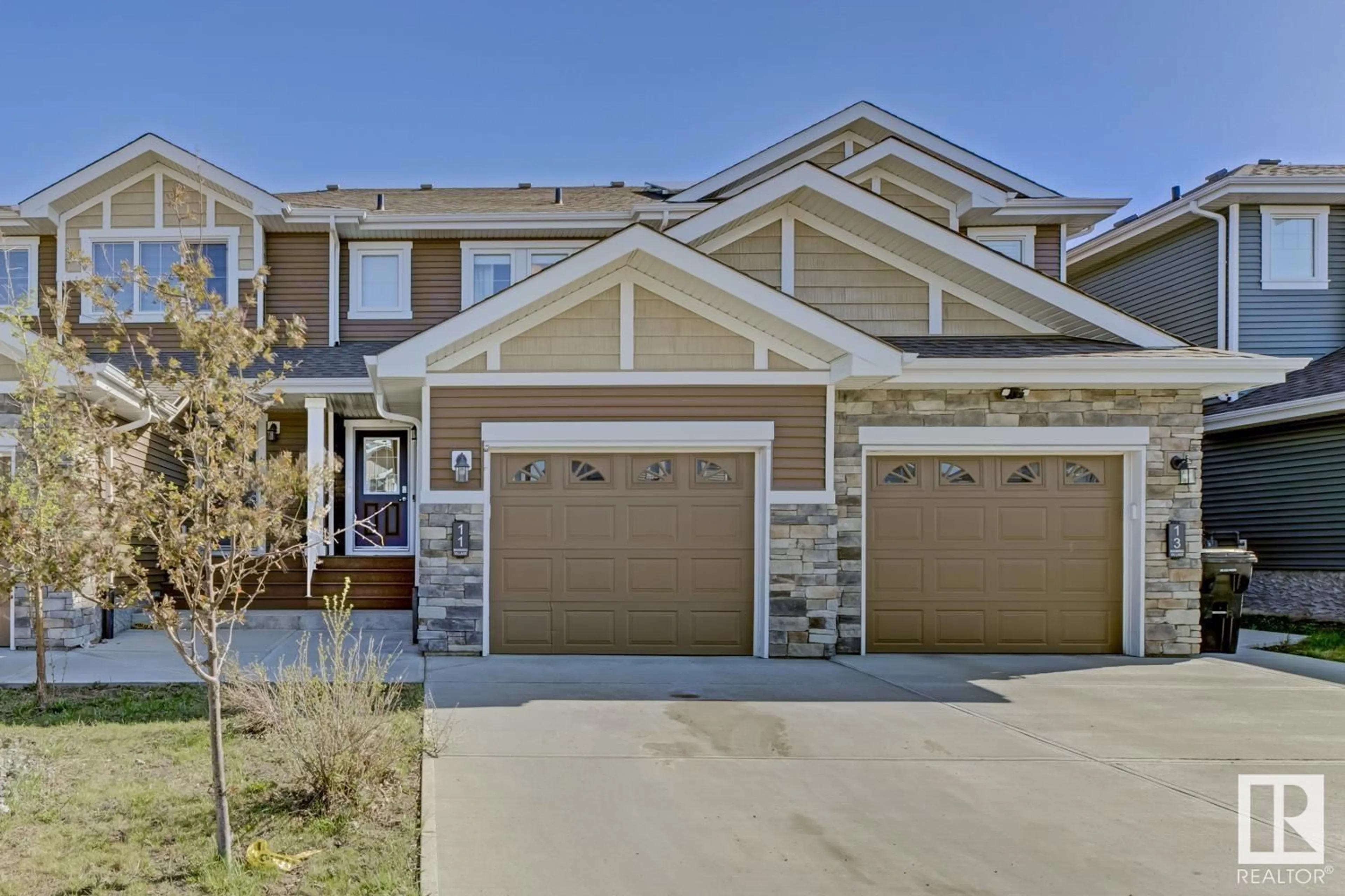 Home with vinyl exterior material, street for 11 EBBERS CL, Edmonton Alberta T5Y3Y4