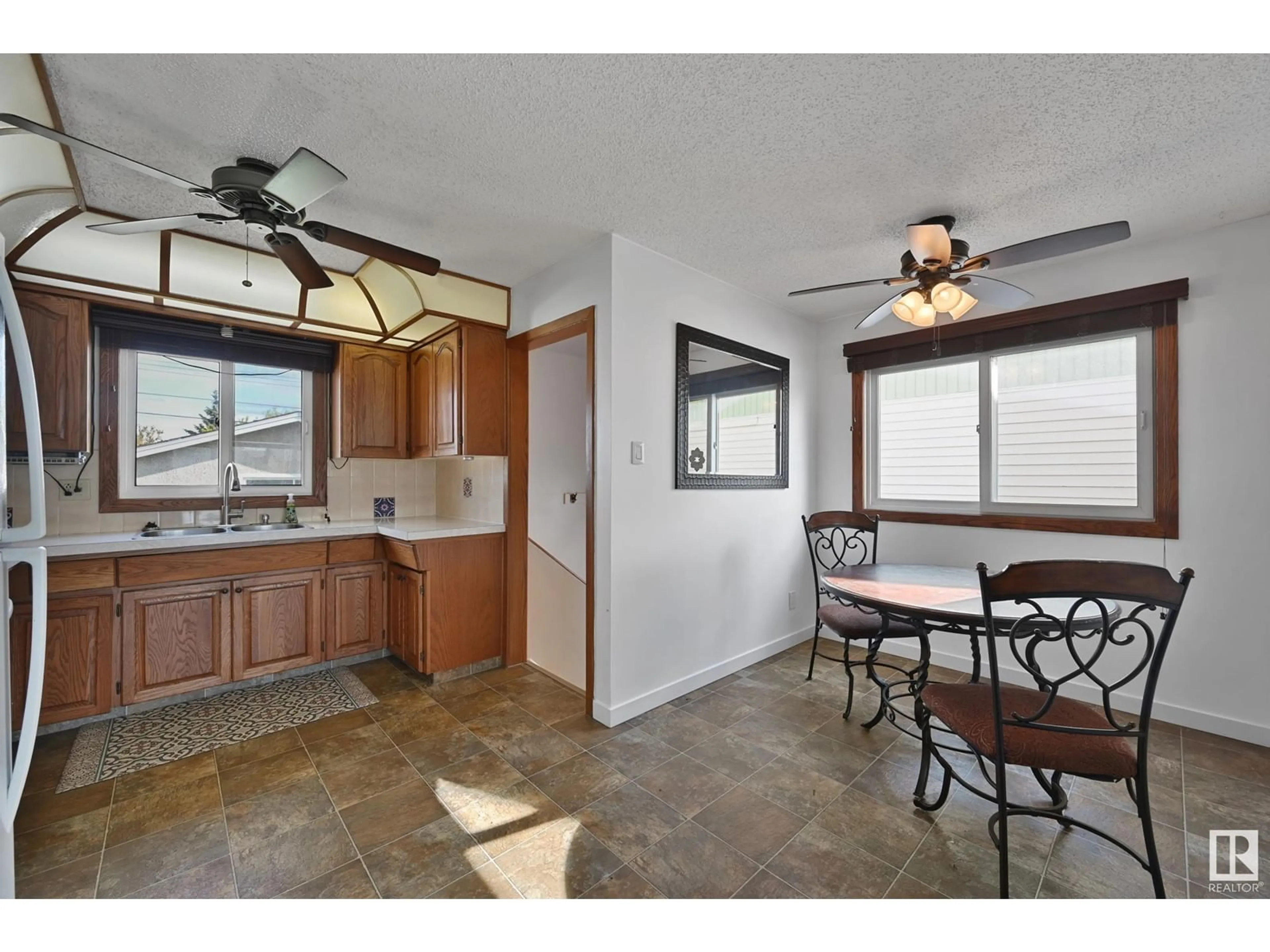 Open concept kitchen, ceramic/tile floor for 7820 130 AV, Edmonton Alberta T5C1V5