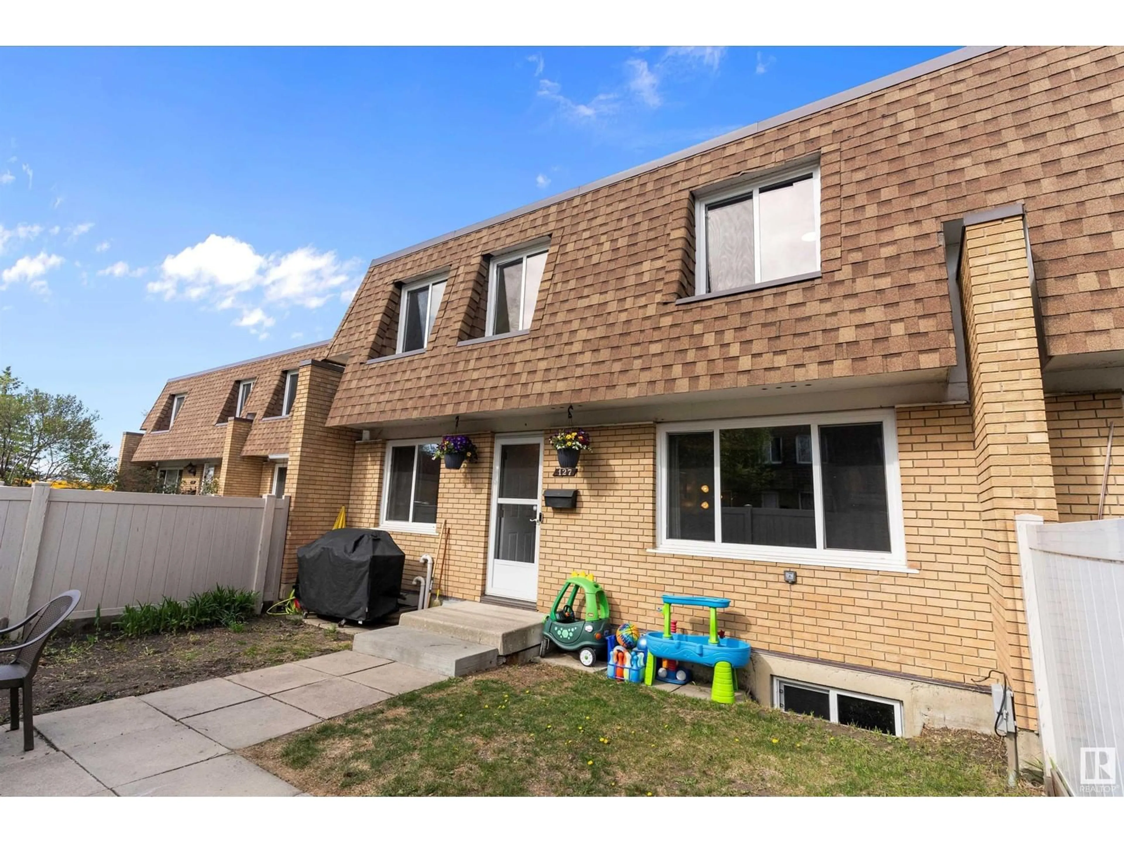 Home with brick exterior material, street for 127 LONDONDERRY SQUARE, Edmonton Alberta T5C3C4