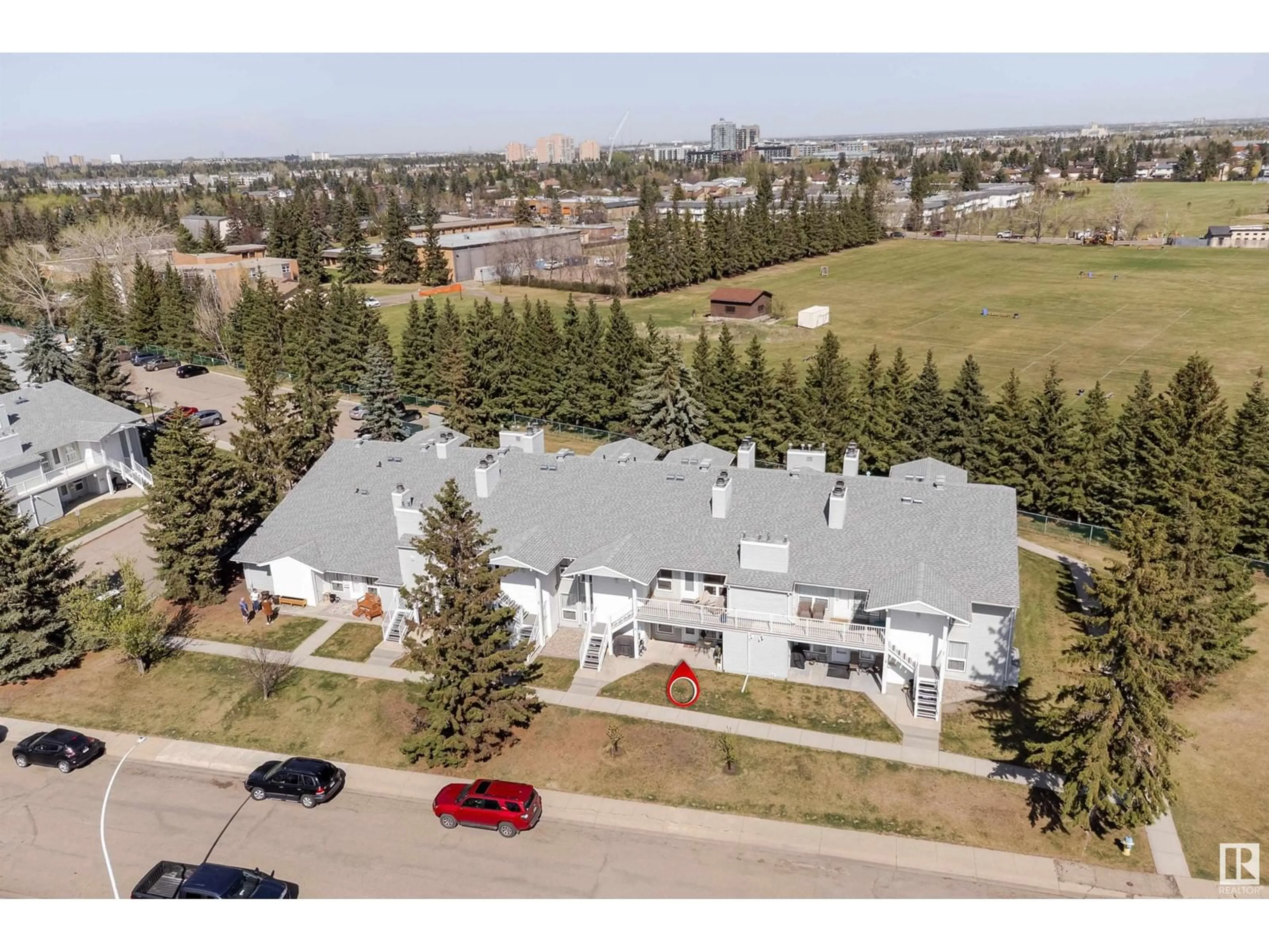 A pic from outside/outdoor area/front of a property/back of a property/a pic from drone, street for #4 - 2115 118 ST, Edmonton Alberta T6J5N1