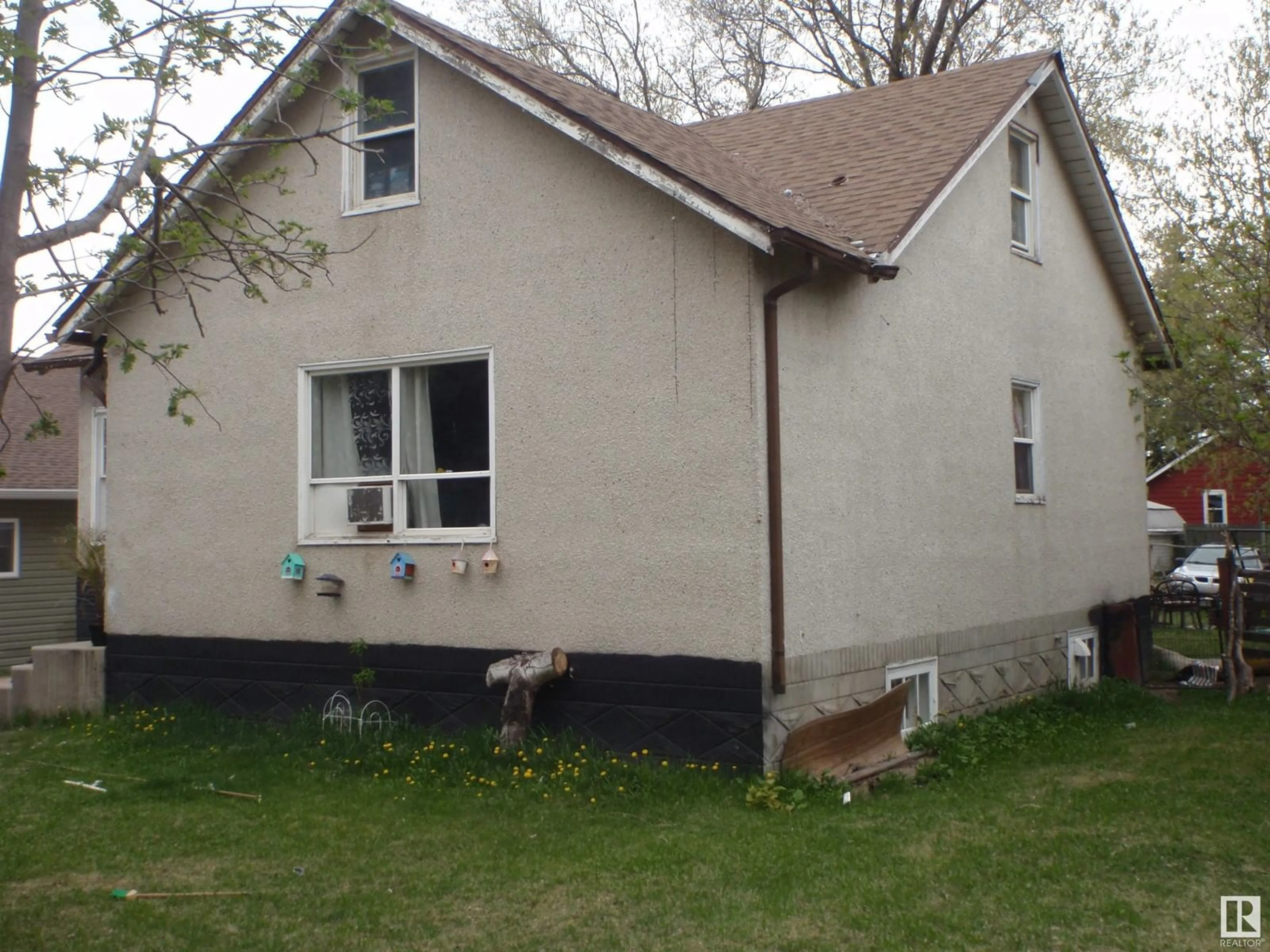 Home with vinyl exterior material, building for 5116 54 ST, Barrhead Alberta T7N1A4