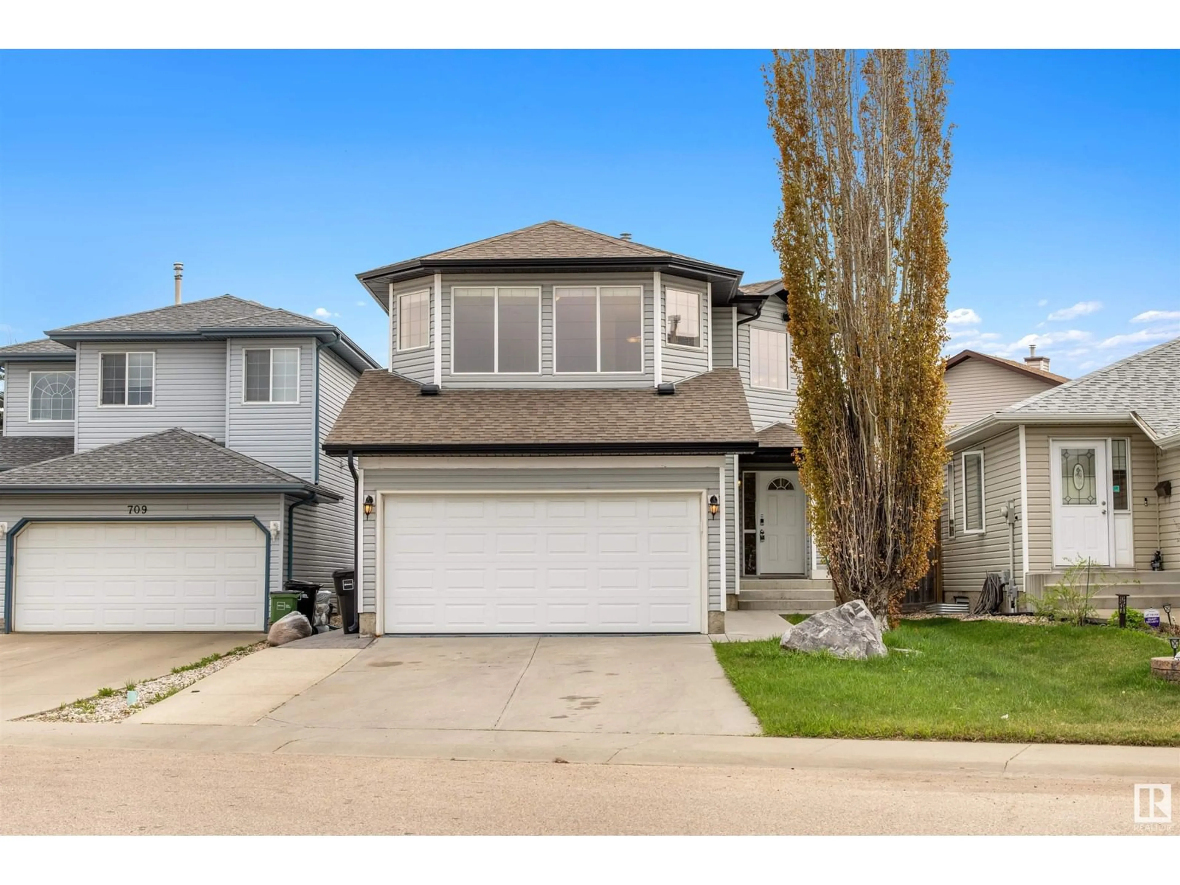 Home with vinyl exterior material, street for 707 HUDSON PL, Edmonton Alberta T6V1N6