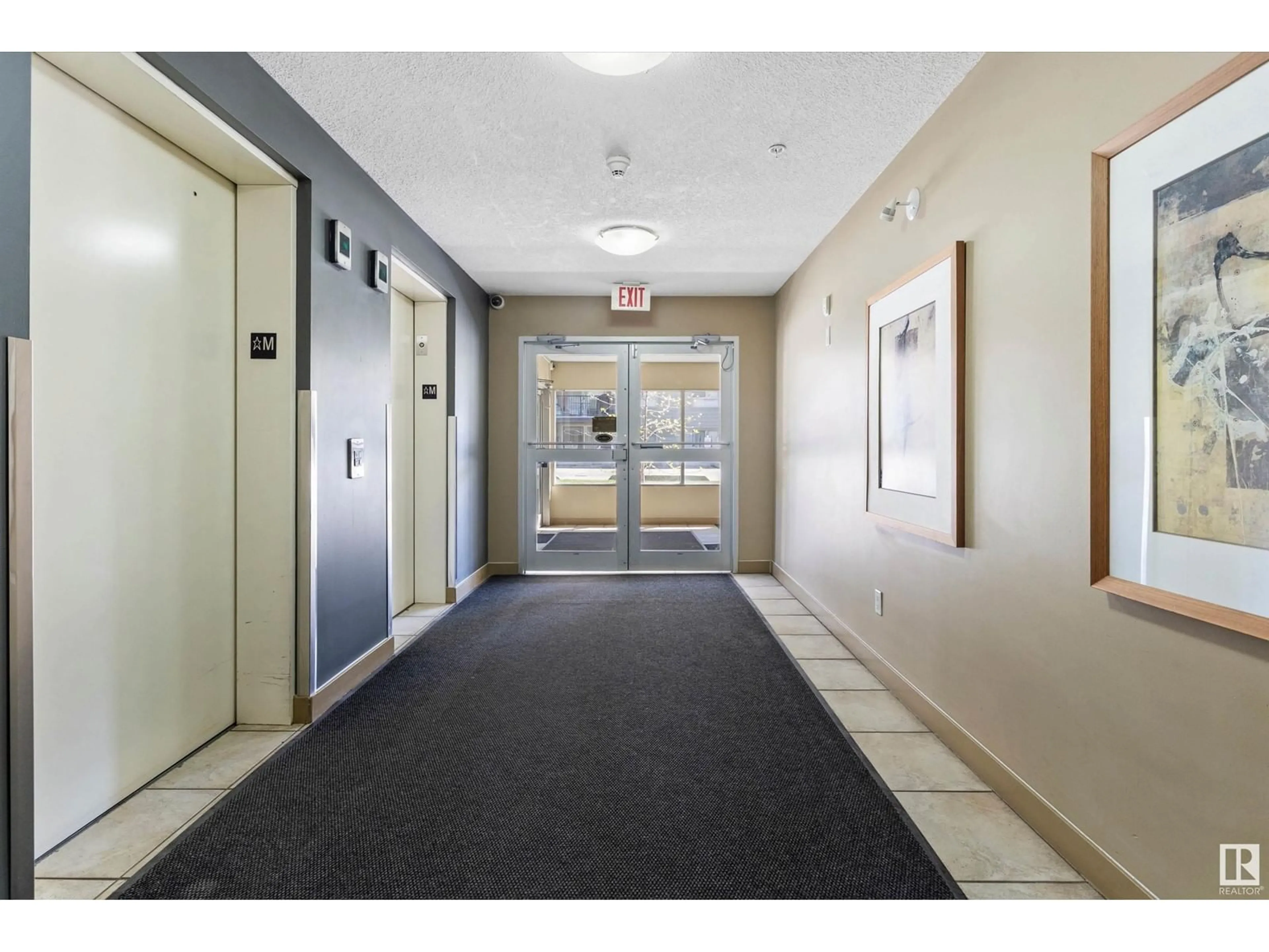 Indoor foyer for #412 - 17011 67 AV, Edmonton Alberta T5T6Y6