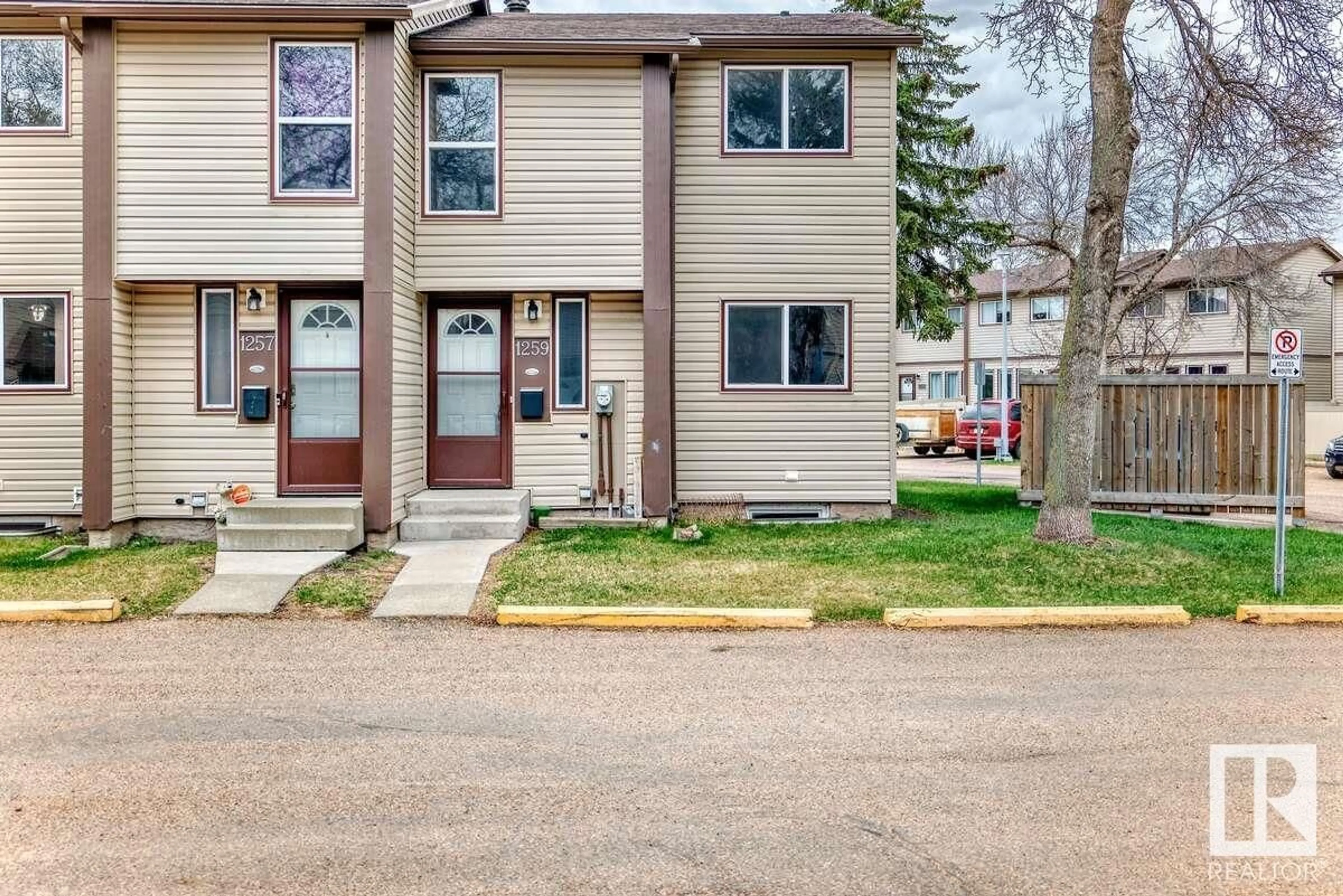 Home with vinyl exterior material, street for 1259 HOOKE RD, Edmonton Alberta T5A4A4