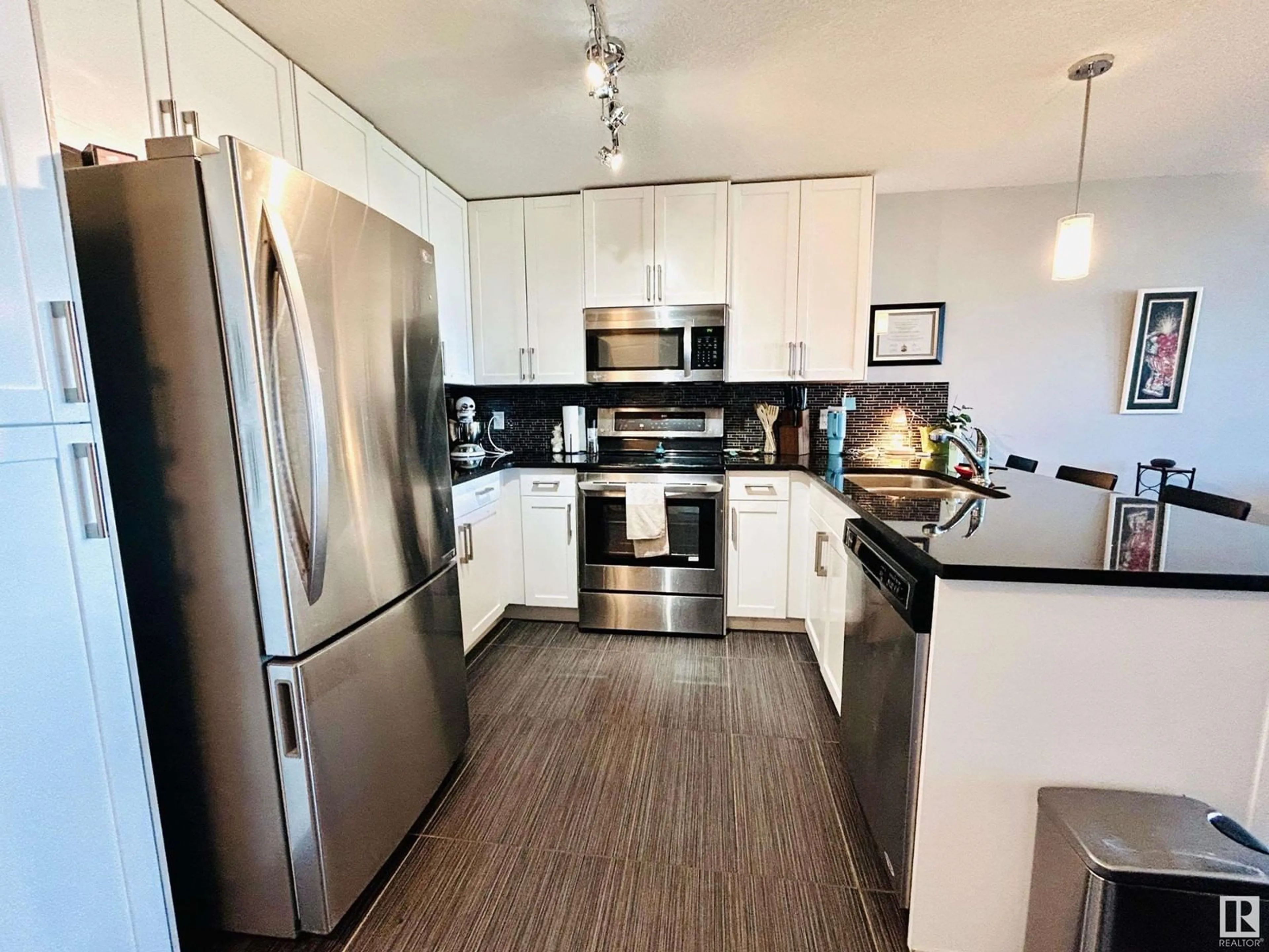 Open concept kitchen, unknown for 5151 - 925 WINDERMERE BV, Edmonton Alberta T6W2K4