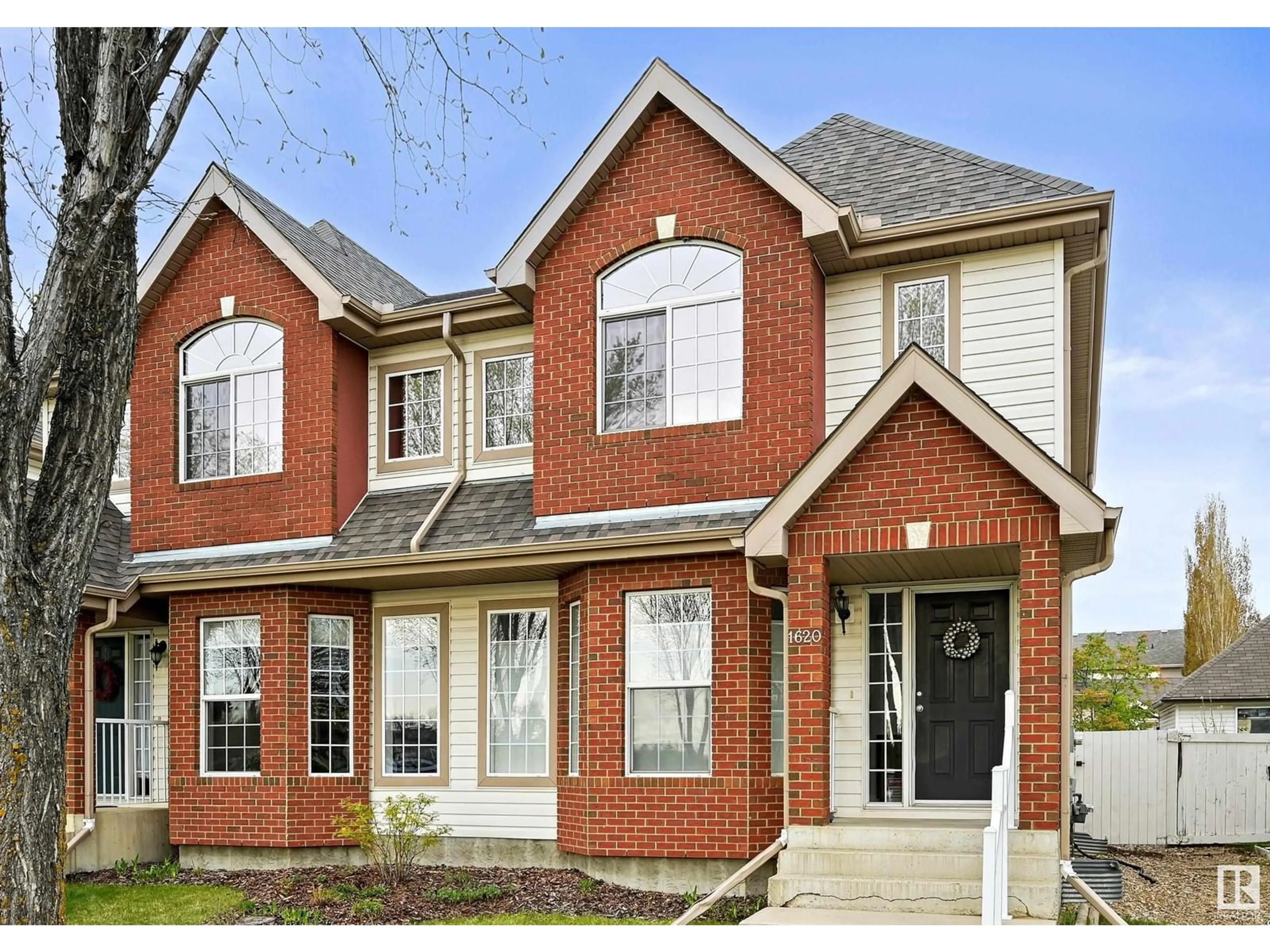 Home with brick exterior material, street for NW - 1620 TOMLINSON CM, Edmonton Alberta T6R2Y7