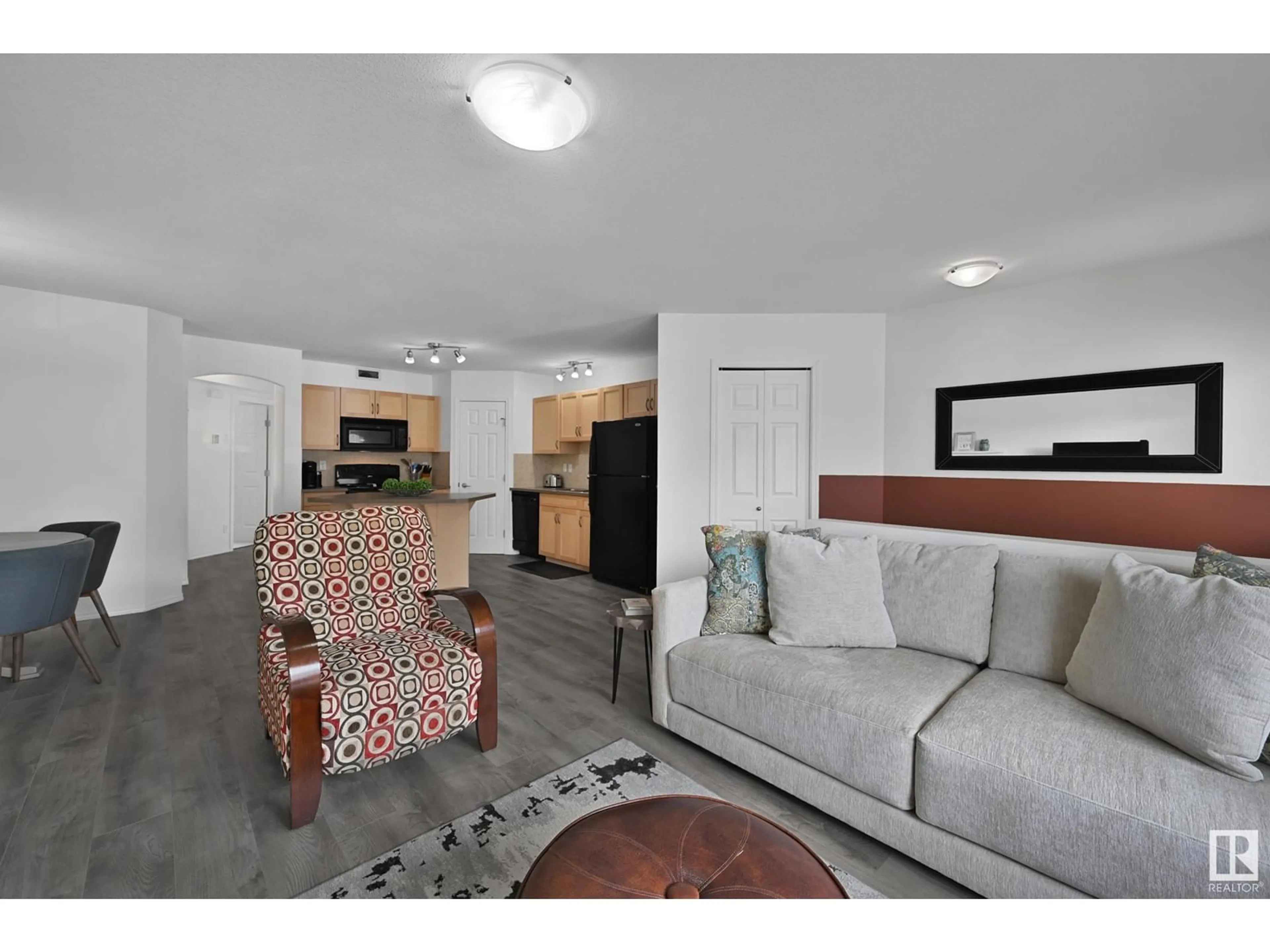 Living room with furniture, unknown for 150 - 76 EDWARDS DR, Edmonton Alberta T6X1M4