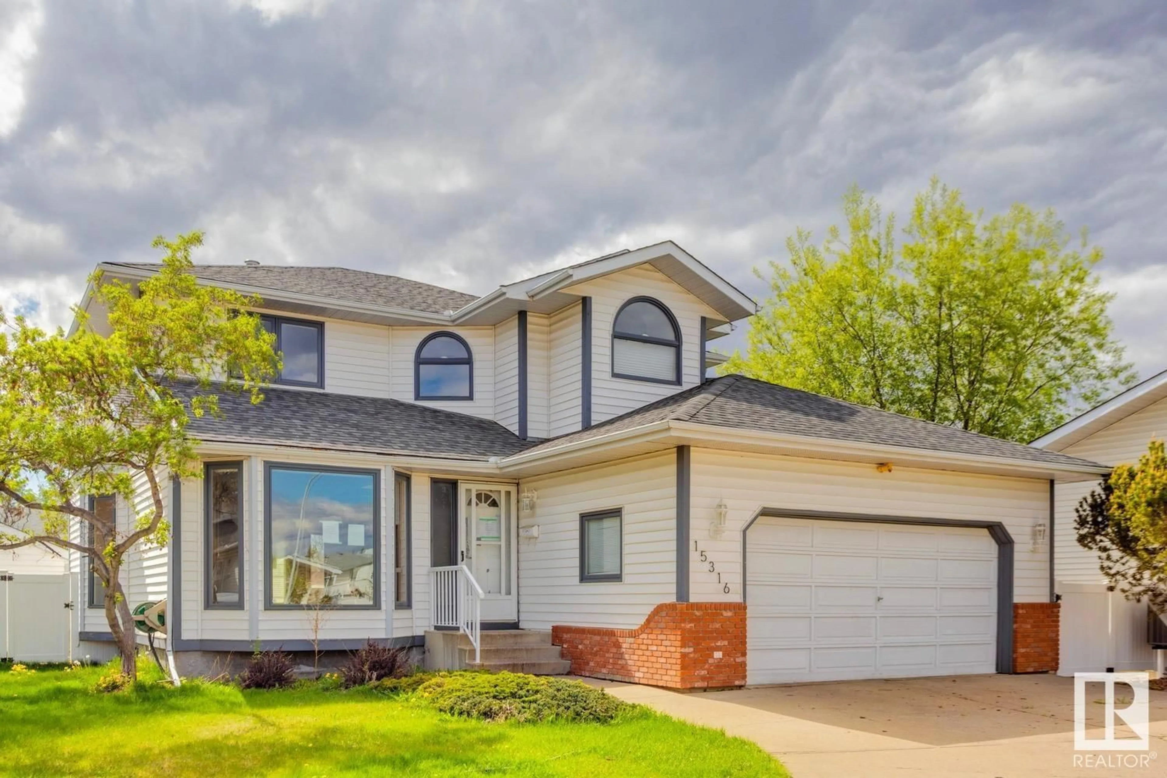 Home with vinyl exterior material, street for 15316 74 ST, Edmonton Alberta T5Z2X8