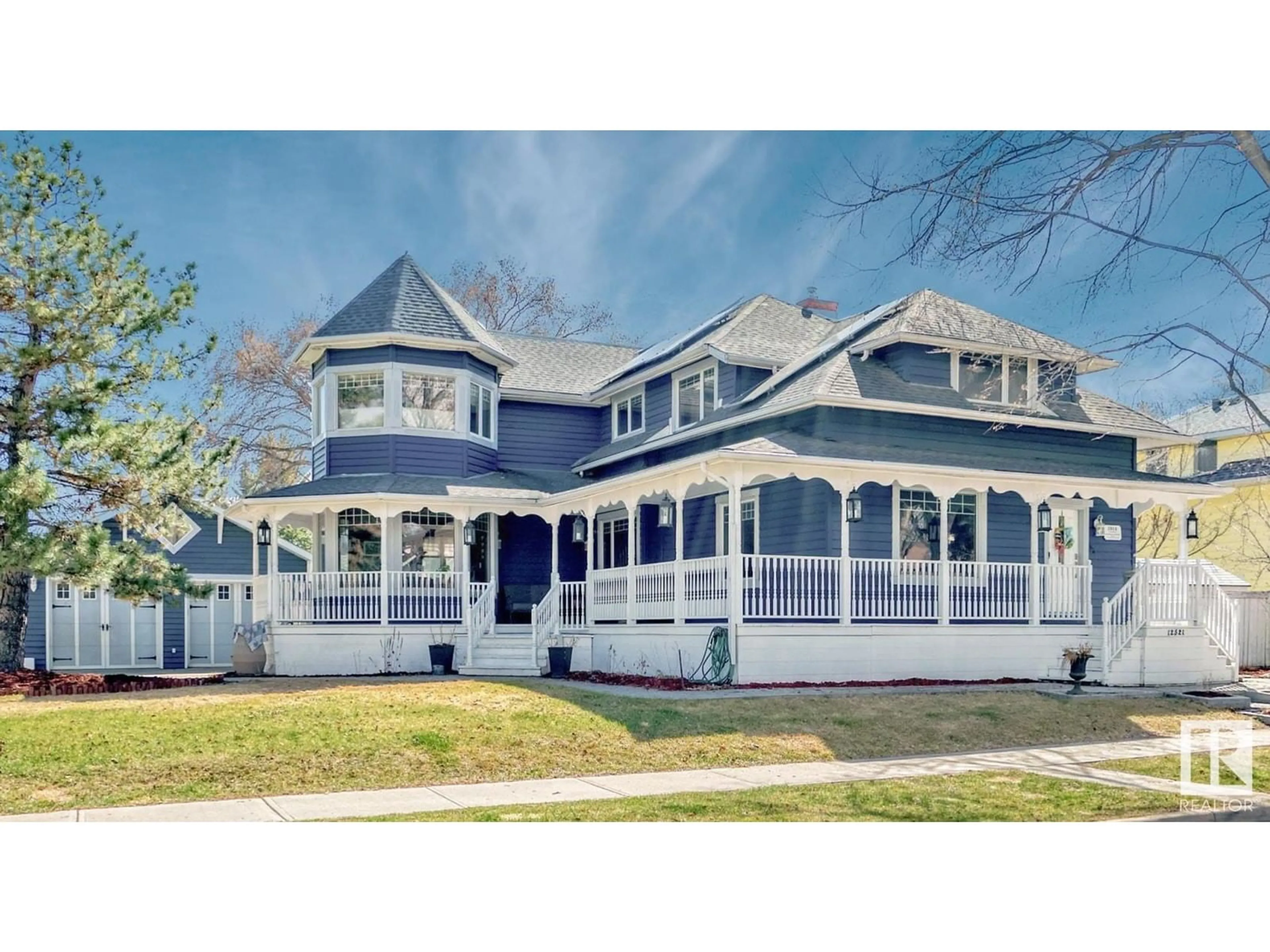 Home with vinyl exterior material, street for NW - 12521 109A AV, Edmonton Alberta T5M2H8