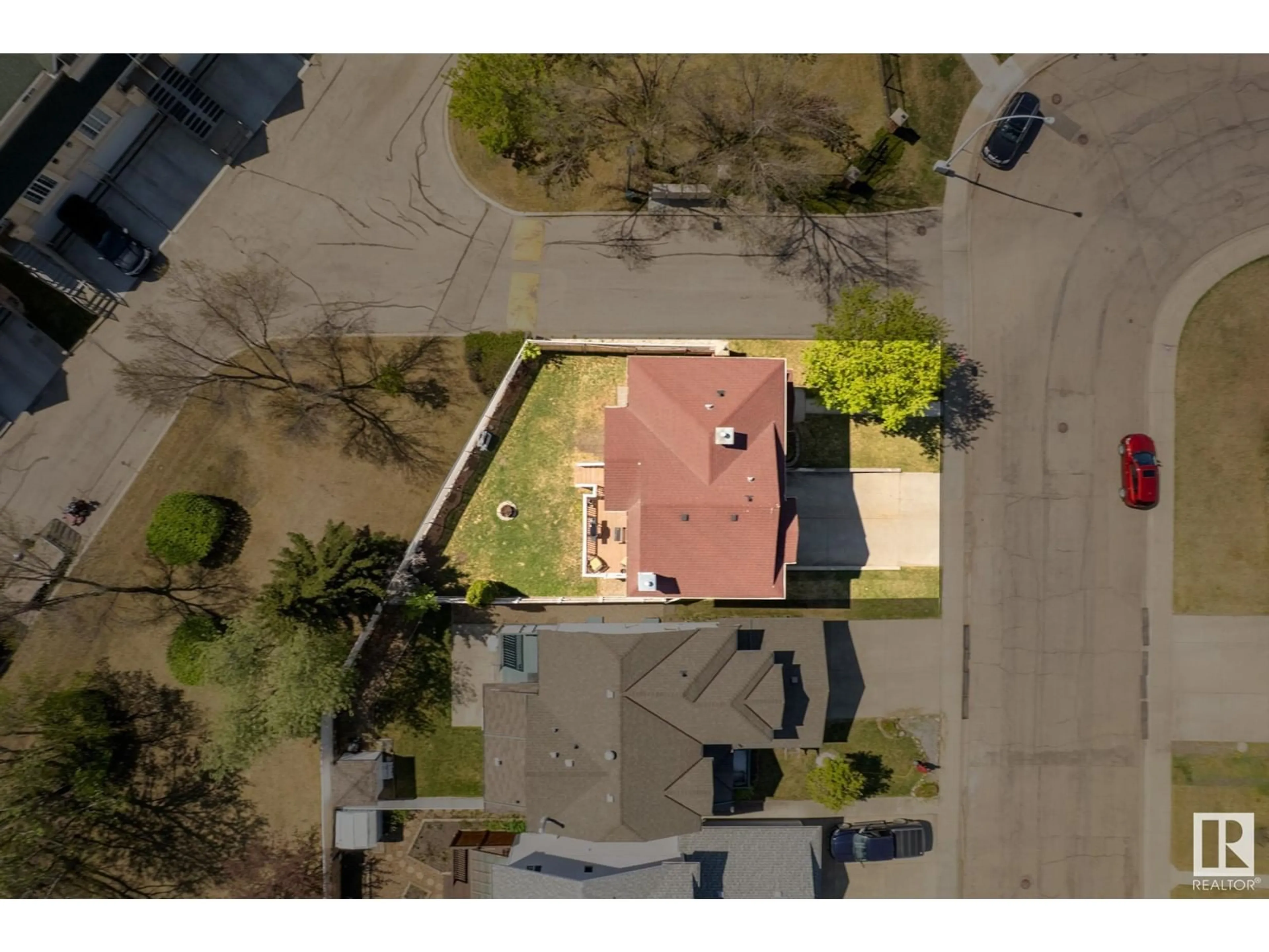 A pic from outside/outdoor area/front of a property/back of a property/a pic from drone, street for NW - 2415 133 AV, Edmonton Alberta T5A4Z9