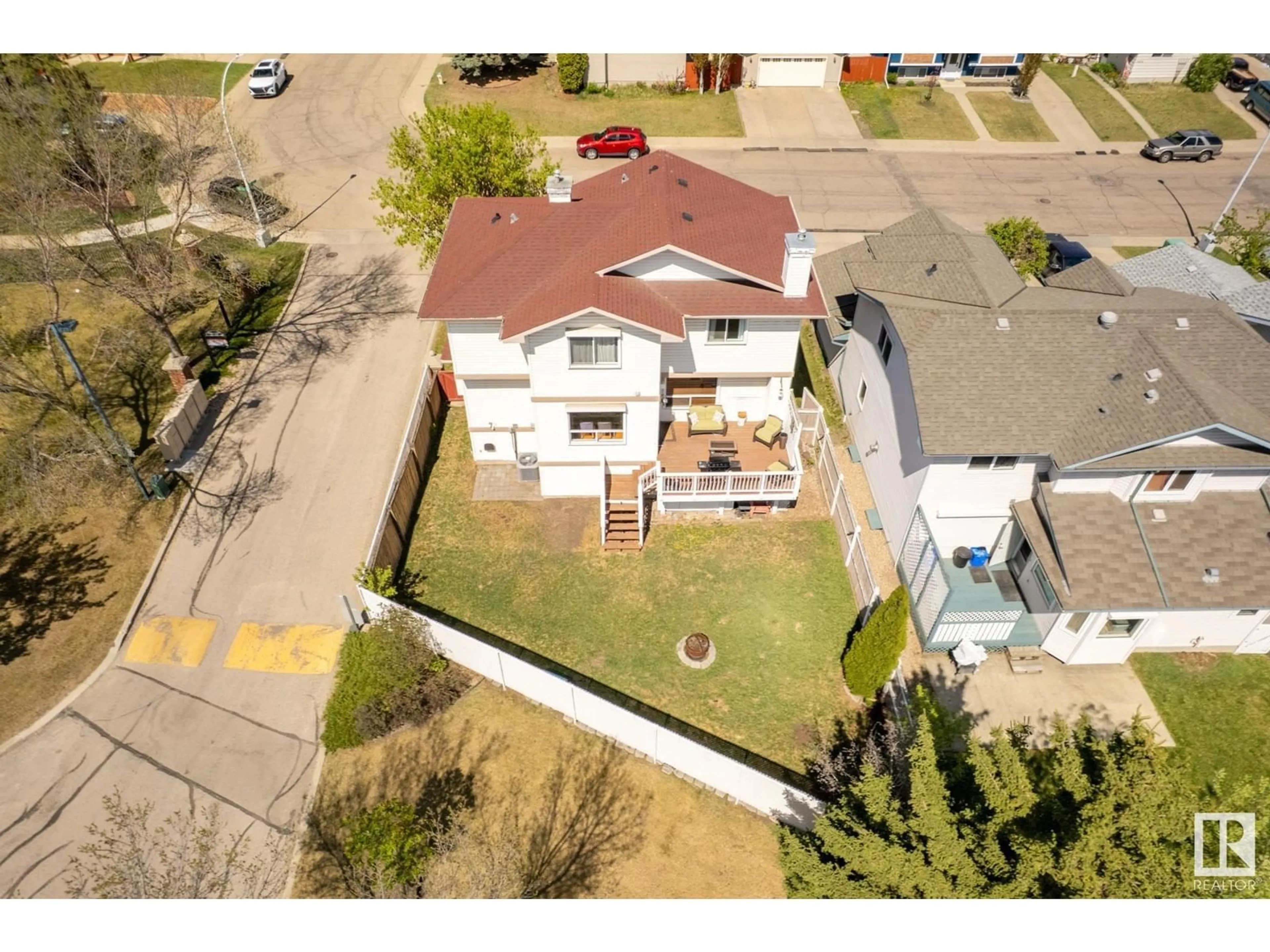 A pic from outside/outdoor area/front of a property/back of a property/a pic from drone, street for NW - 2415 133 AV, Edmonton Alberta T5A4Z9