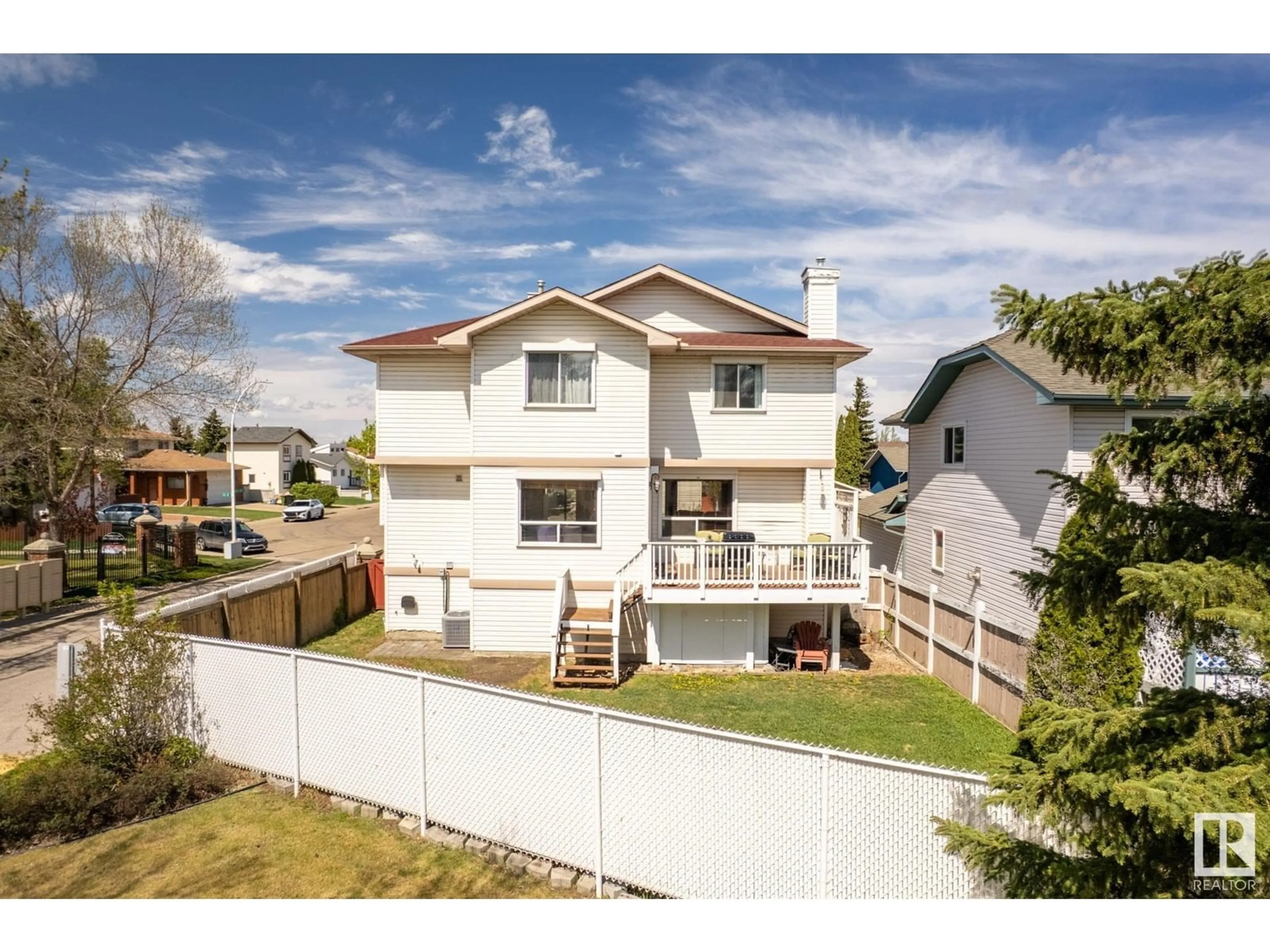 A pic from outside/outdoor area/front of a property/back of a property/a pic from drone, unknown for NW - 2415 133 AV, Edmonton Alberta T5A4Z9