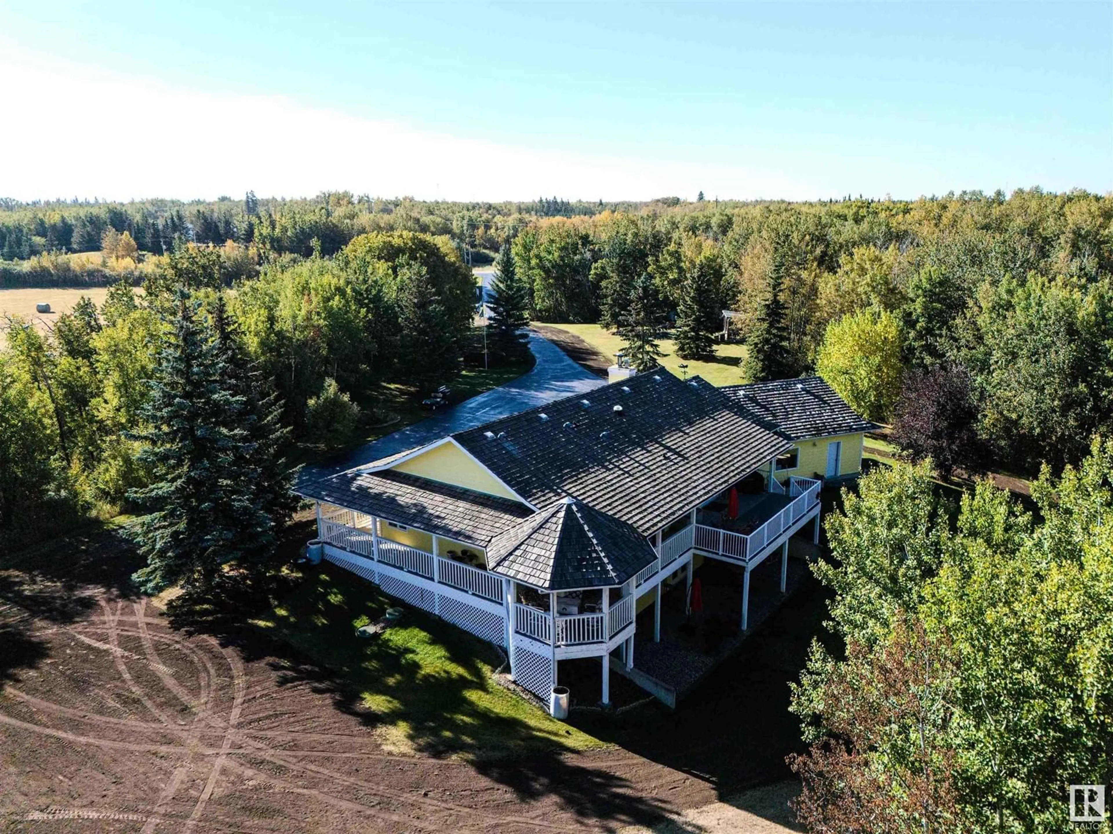 A pic from outside/outdoor area/front of a property/back of a property/a pic from drone, water/lake/river/ocean view for 23038 TWP ROAD 512, Rural Strathcona County Alberta T8B1K7
