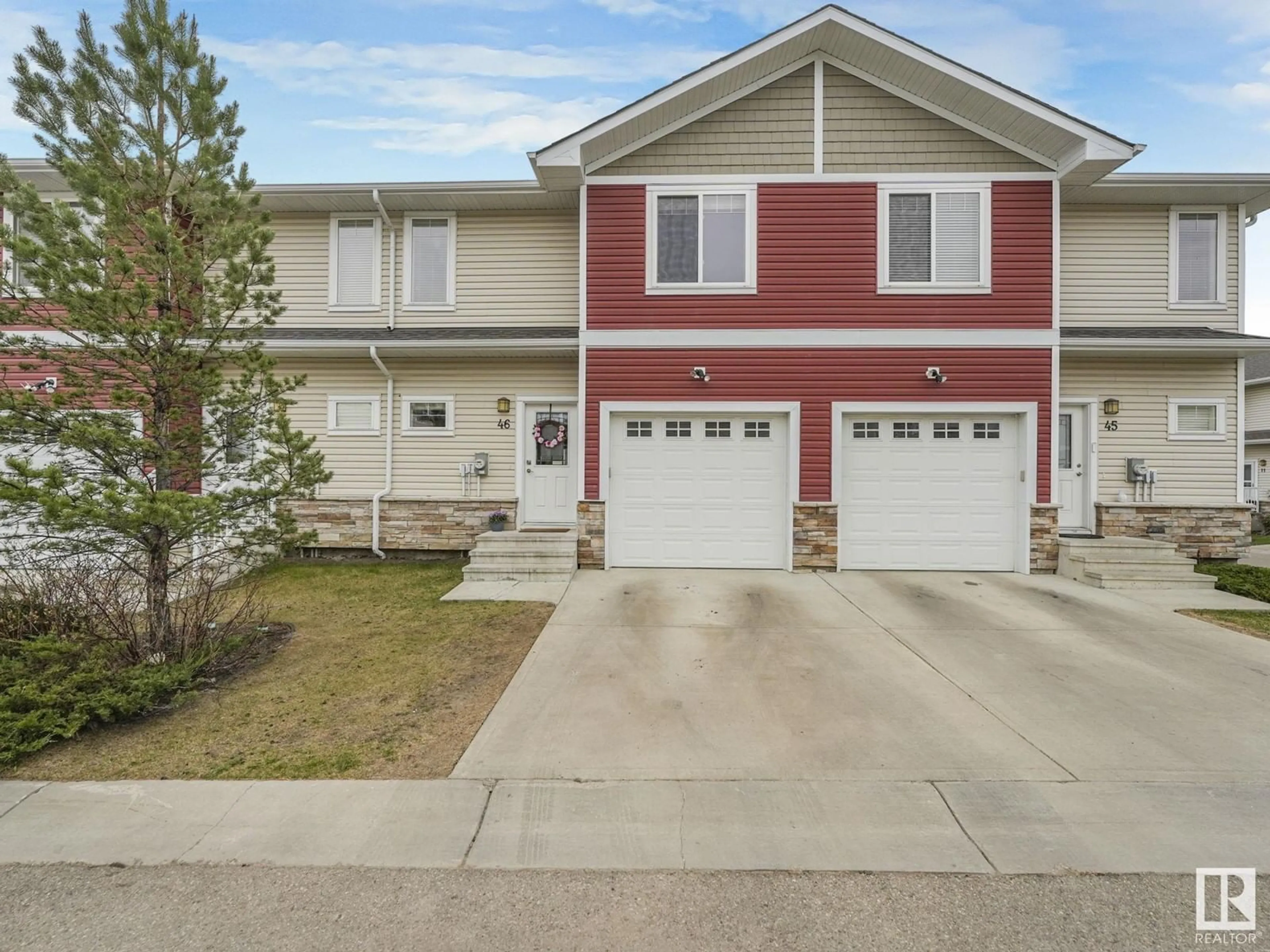 Home with vinyl exterior material, street for 450 - 46 MCCONACHIE WY, Edmonton Alberta T5Y0S8