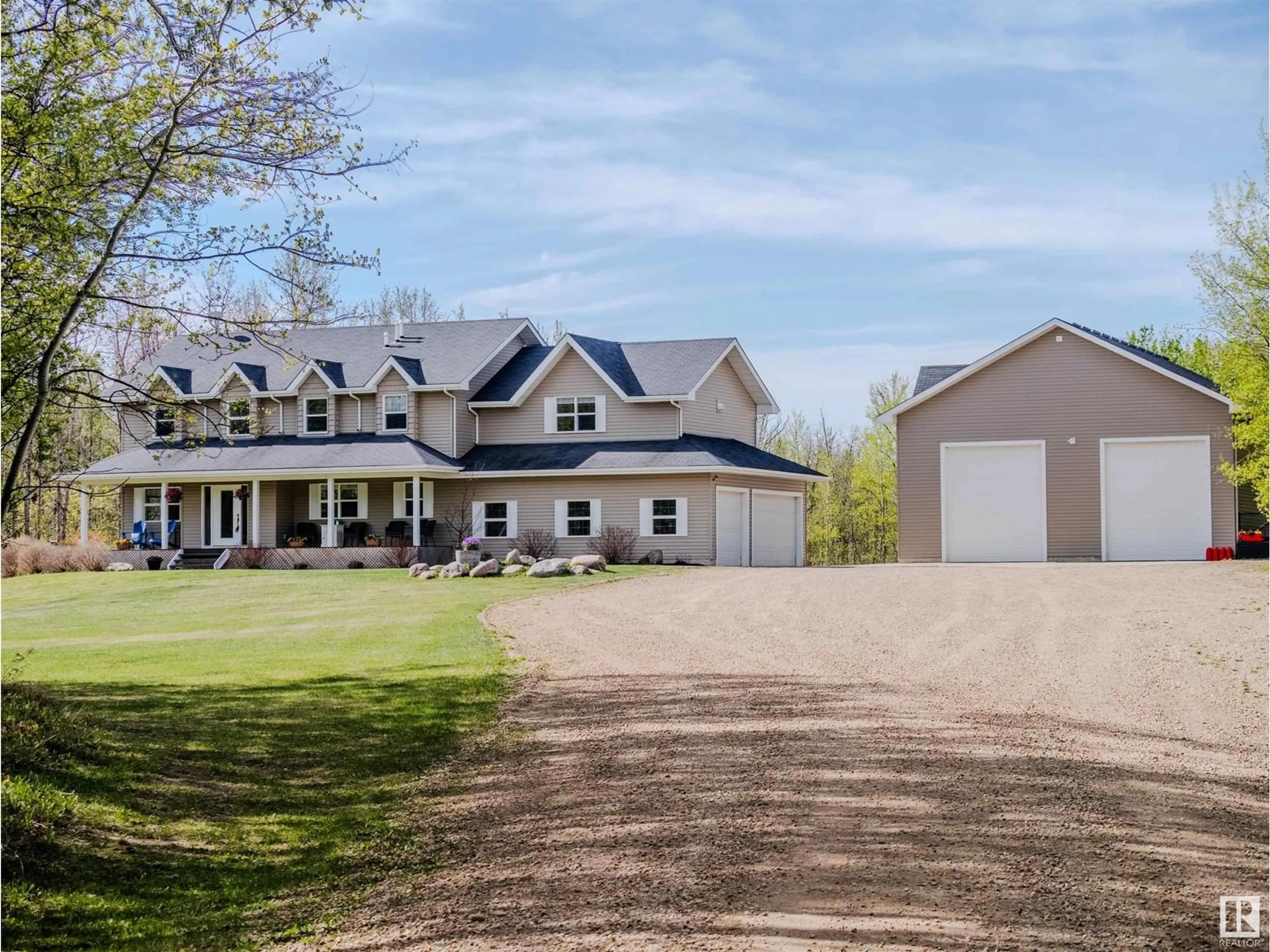 A pic from outside/outdoor area/front of a property/back of a property/a pic from drone, unknown for 21435 TWP ROAD 530, Rural Strathcona County Alberta T8E2H4
