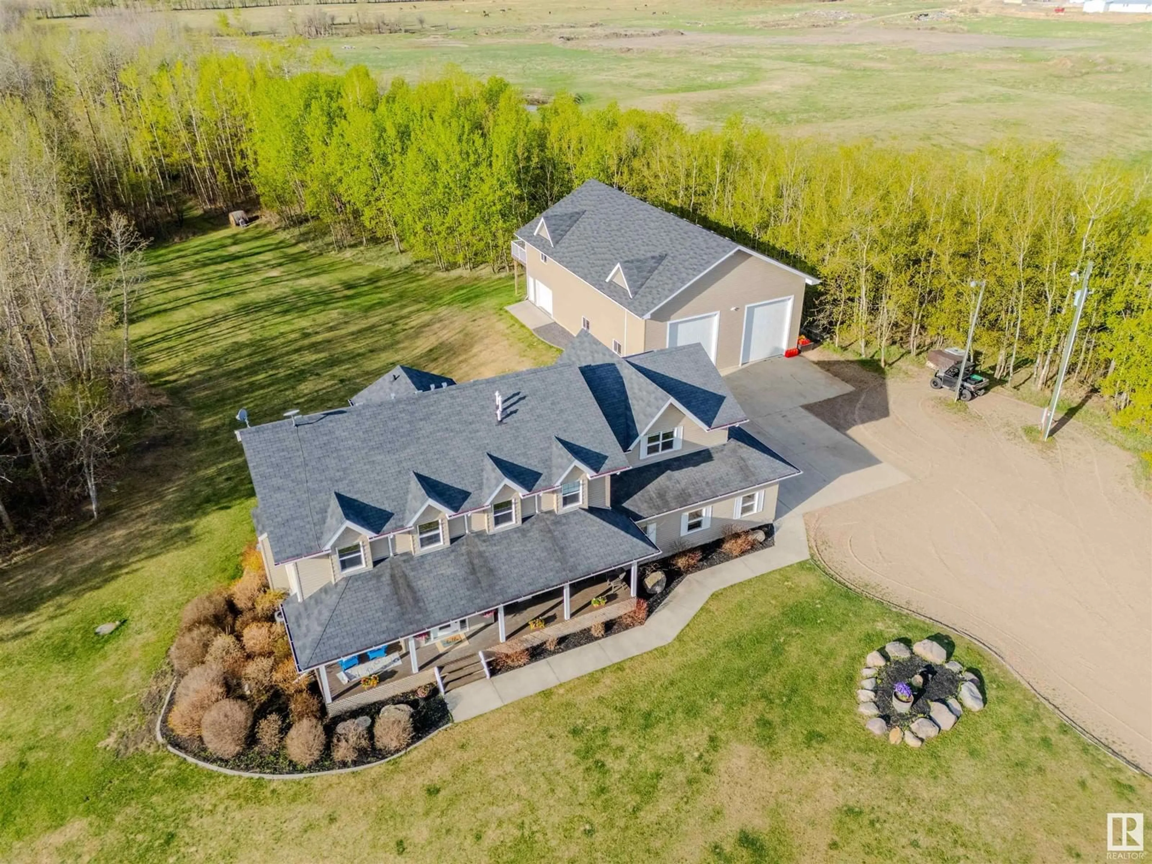 A pic from outside/outdoor area/front of a property/back of a property/a pic from drone, unknown for 21435 TWP ROAD 530, Rural Strathcona County Alberta T8E2H4