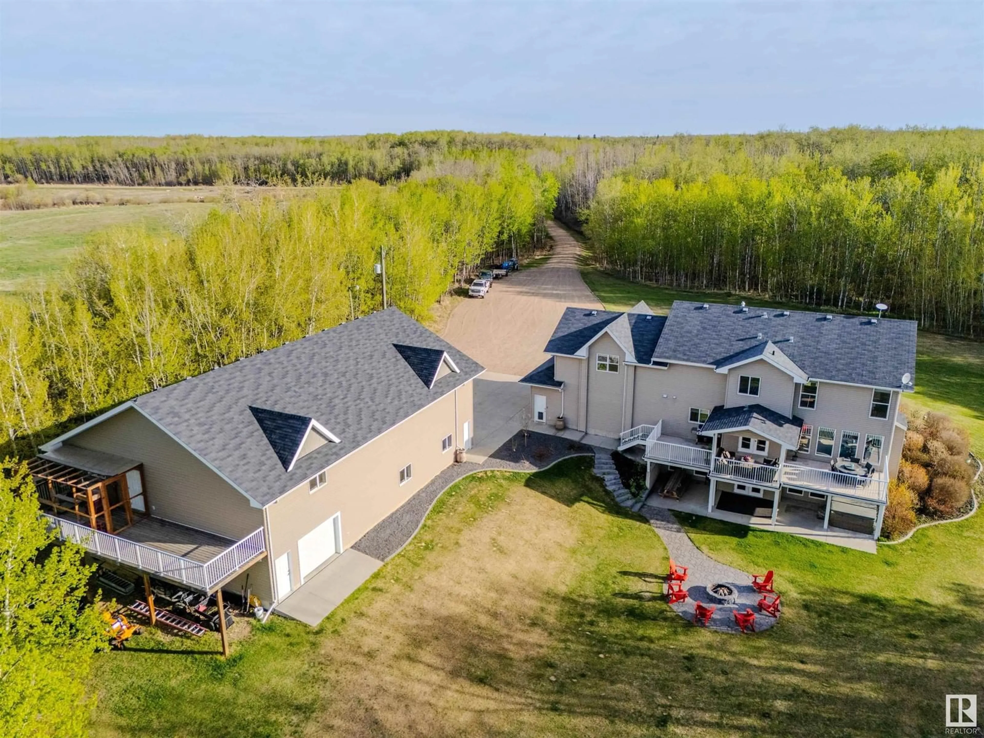 A pic from outside/outdoor area/front of a property/back of a property/a pic from drone, water/lake/river/ocean view for 21435 TWP ROAD 530, Rural Strathcona County Alberta T8E2H4