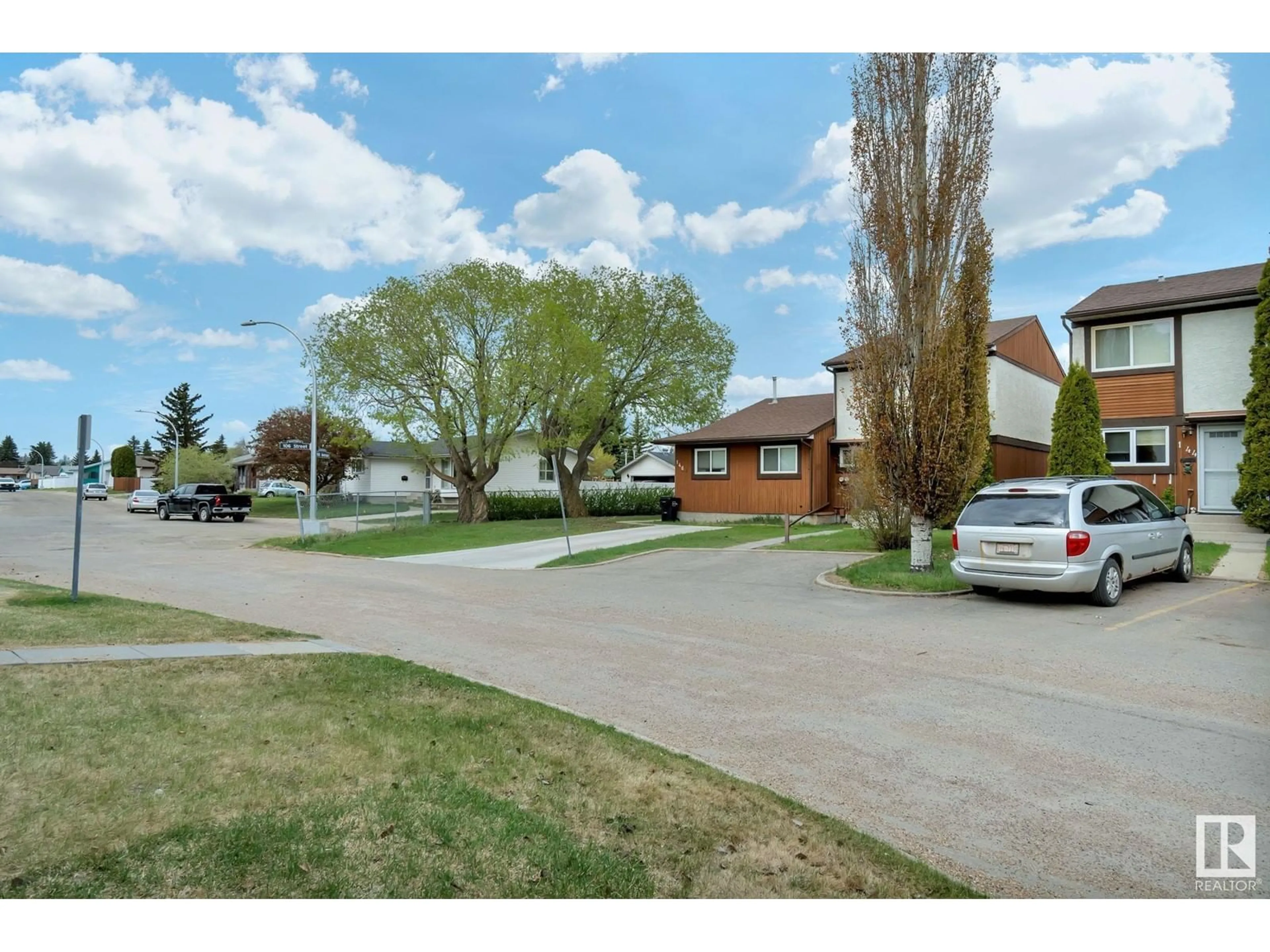 A pic from outside/outdoor area/front of a property/back of a property/a pic from drone, street for #145 - 16725 106 ST, Edmonton Alberta T5X5G5