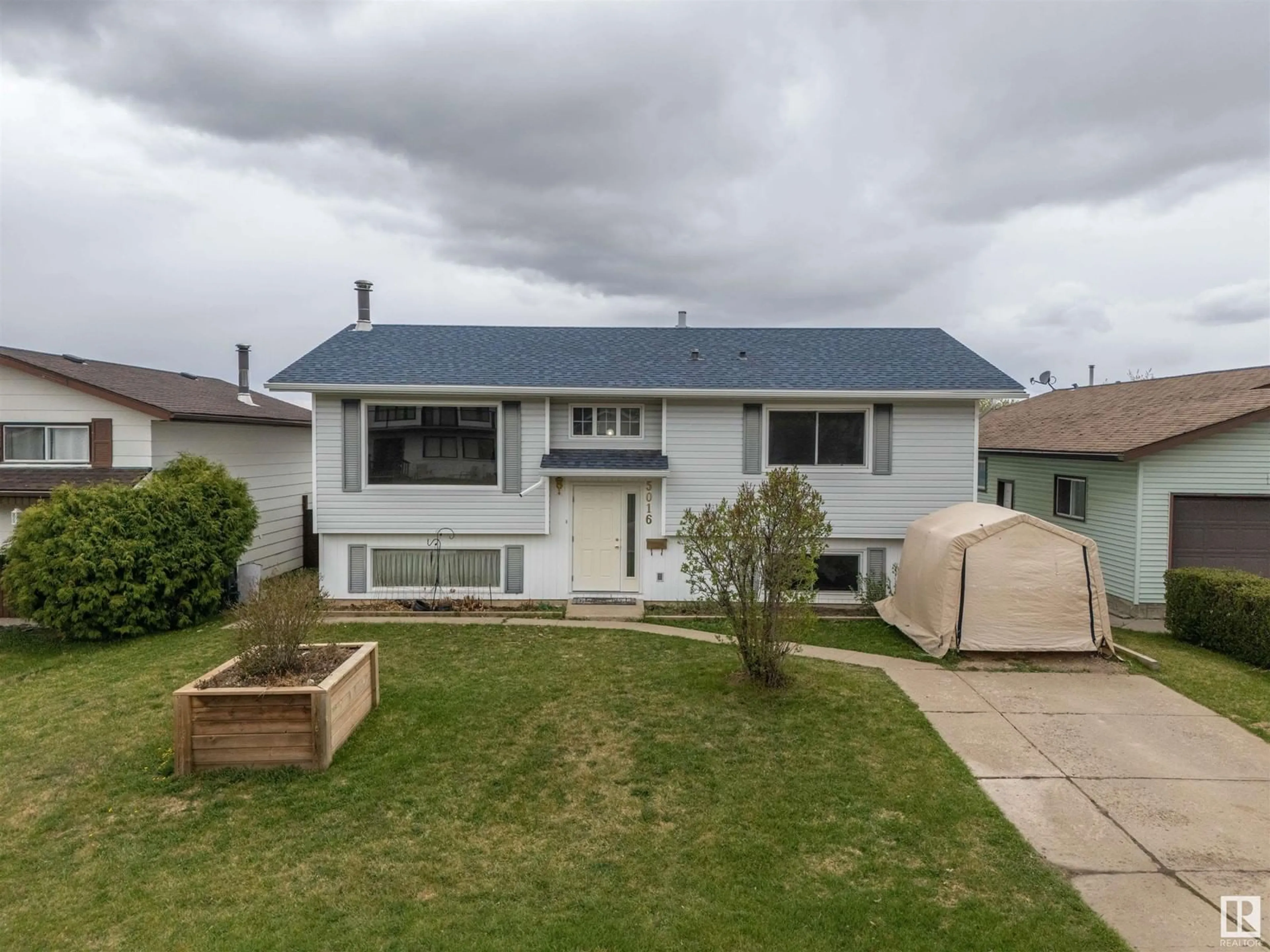 A pic from outside/outdoor area/front of a property/back of a property/a pic from drone, street for 5016 42 ST, Cold Lake Alberta T9M2A5