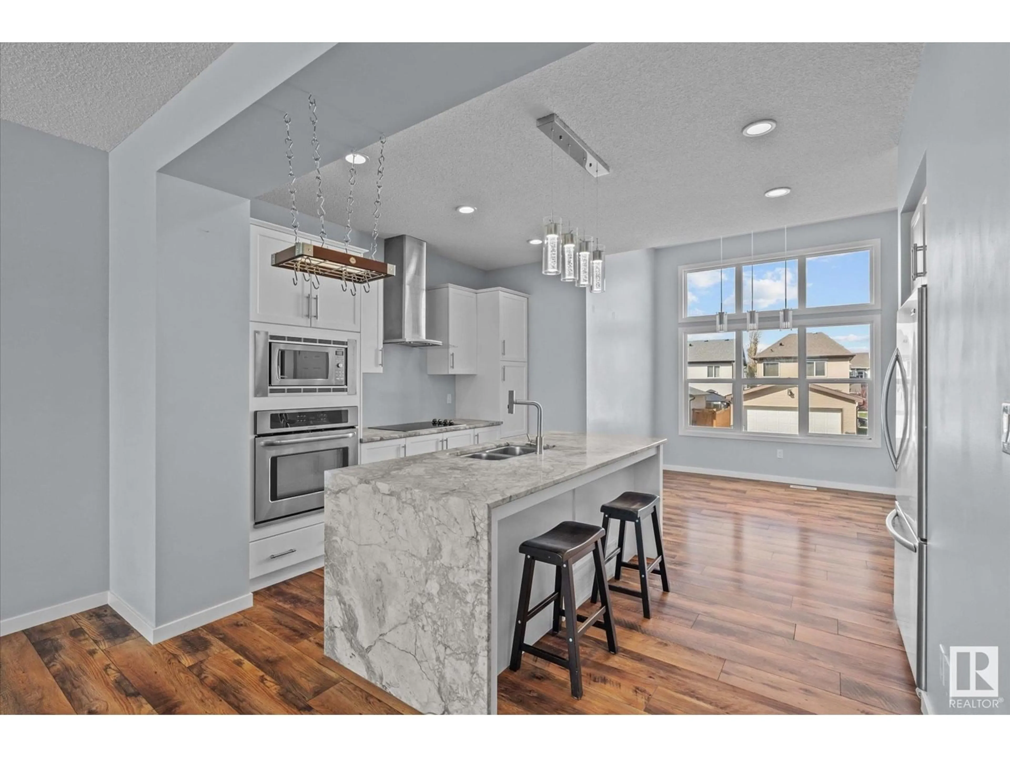 Open concept kitchen, unknown for NW - 17673 60A ST, Edmonton Alberta T5Y0K8