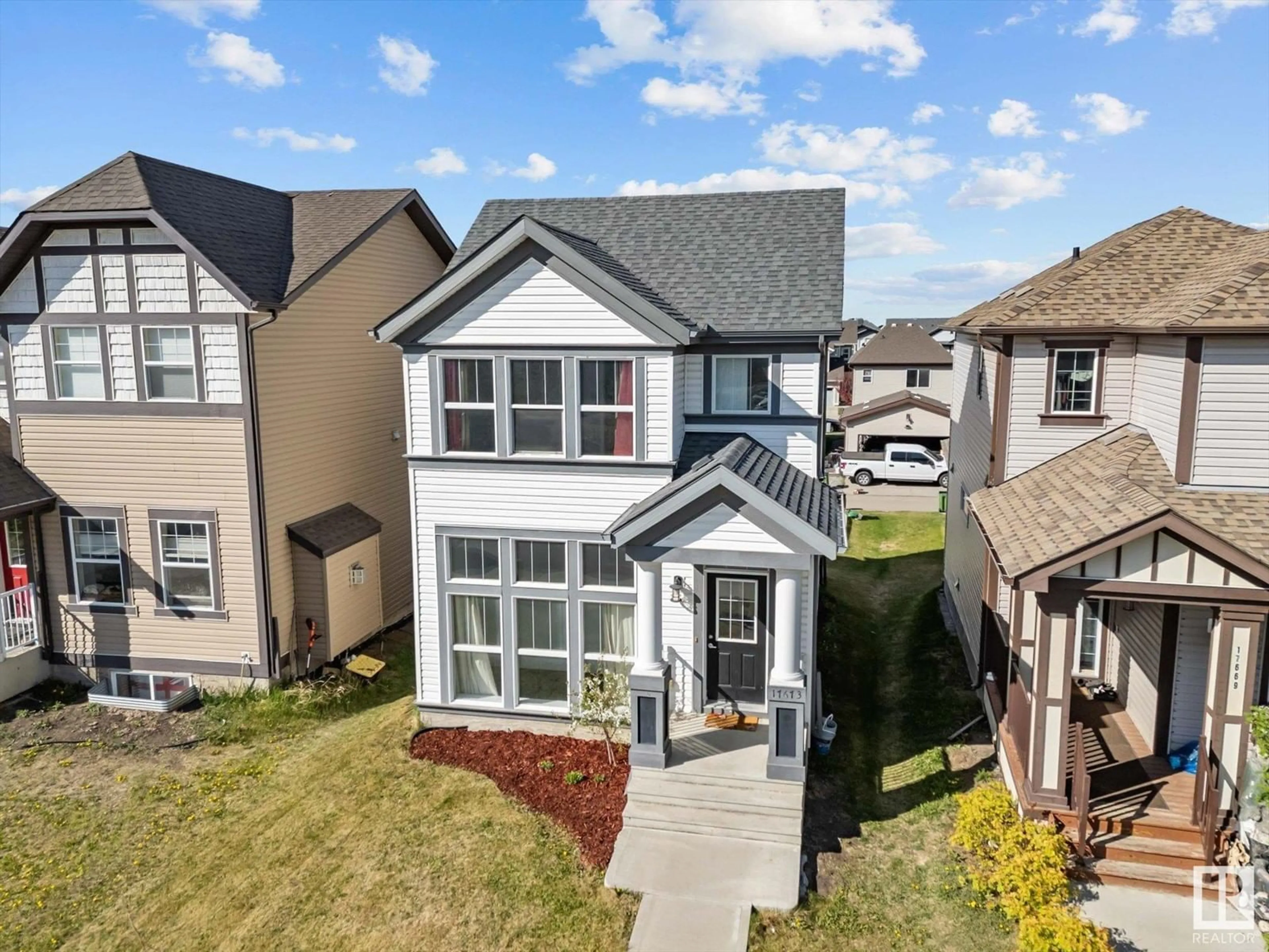 A pic from outside/outdoor area/front of a property/back of a property/a pic from drone, street for NW - 17673 60A ST, Edmonton Alberta T5Y0K8