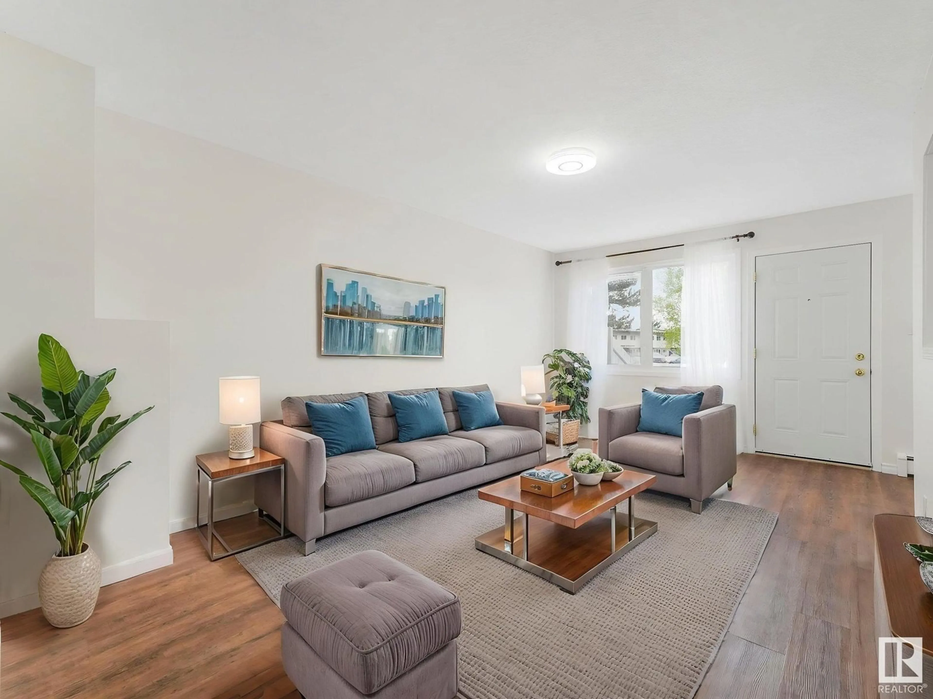 Living room with furniture, unknown for #117 - 16344 109 ST, Edmonton Alberta T5X2T4