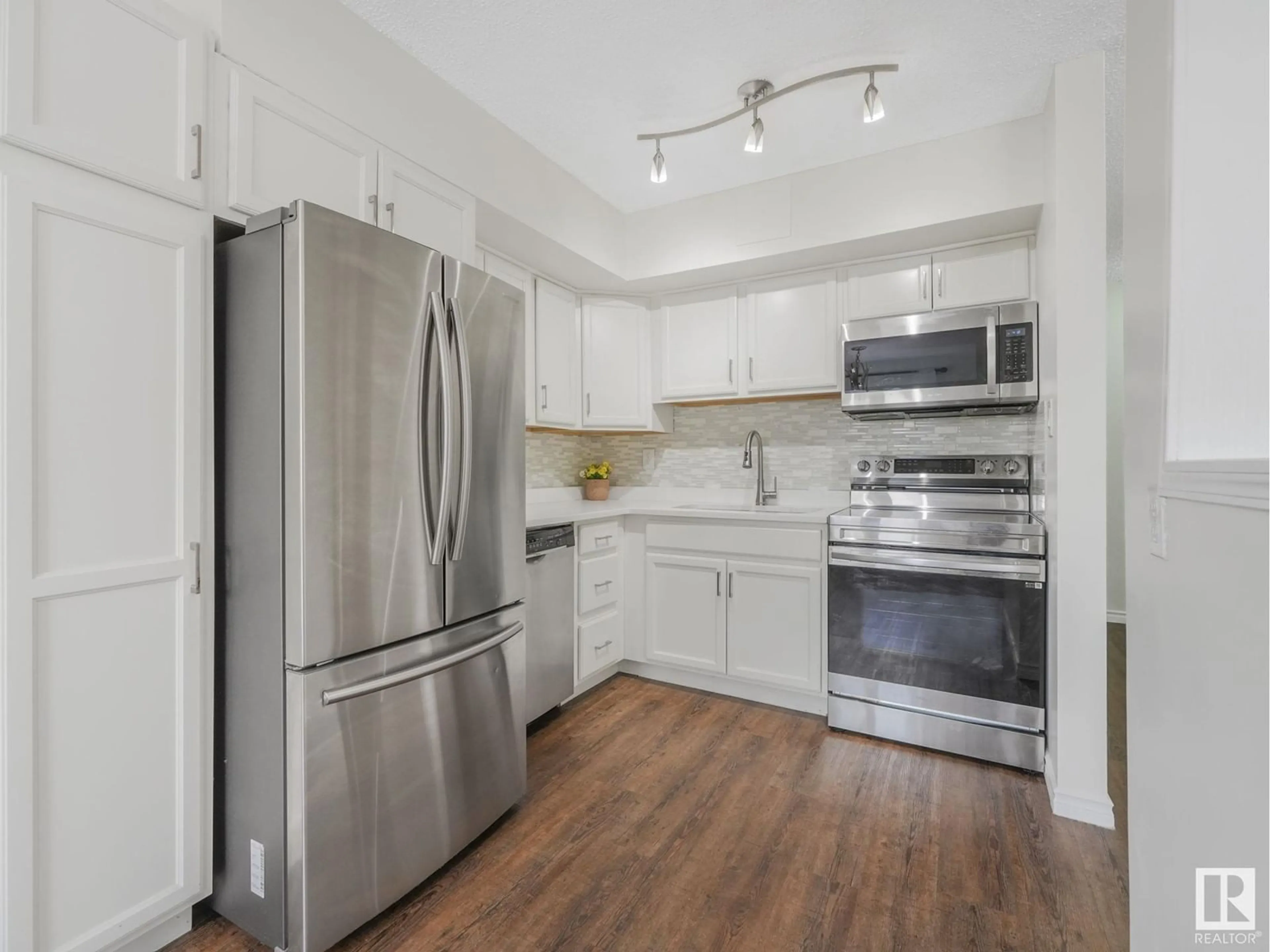 Standard kitchen, unknown for #117 - 16344 109 ST, Edmonton Alberta T5X2T4