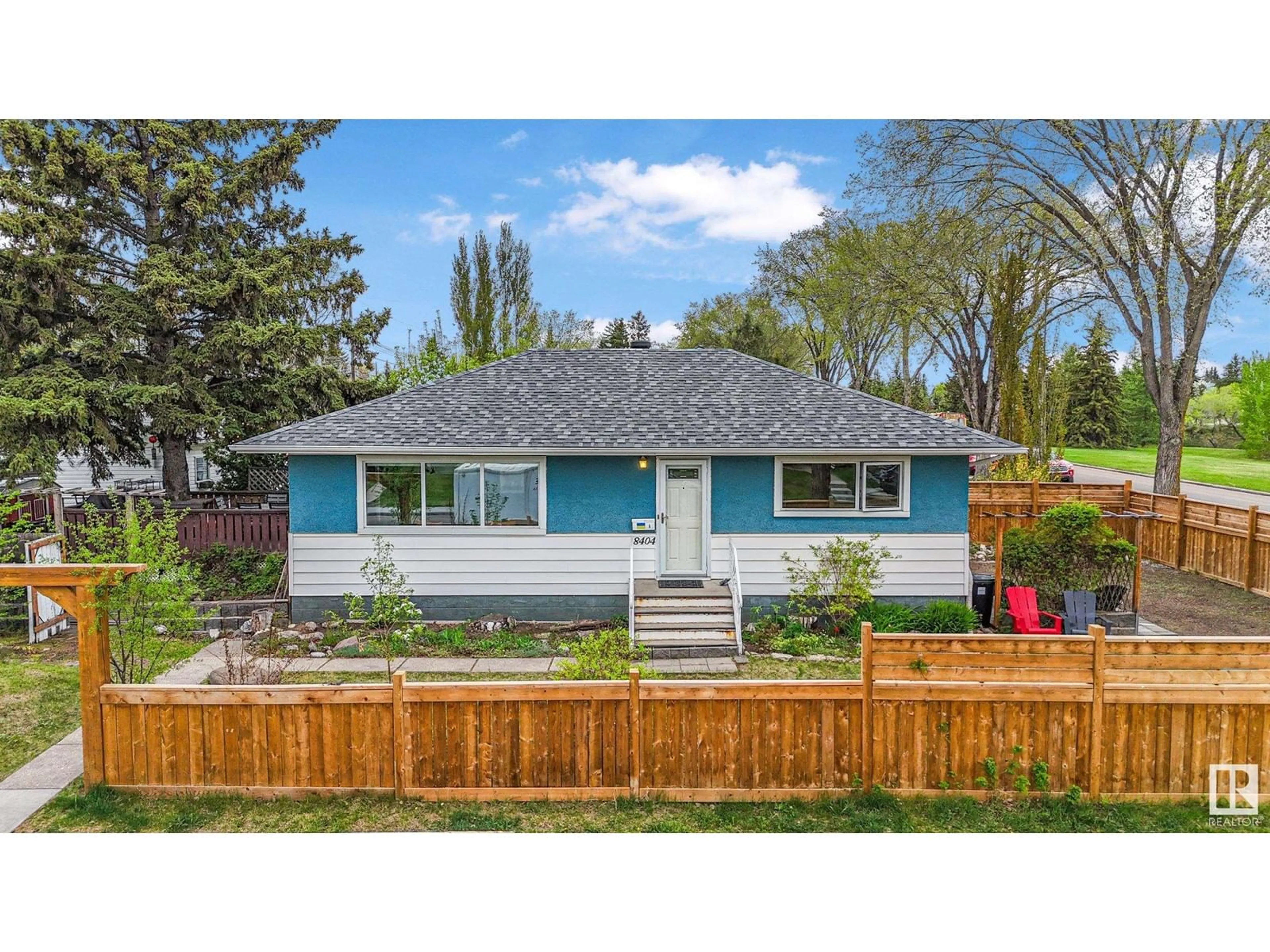 Home with vinyl exterior material, street for 8404 64 AV, Edmonton Alberta T6E0H2