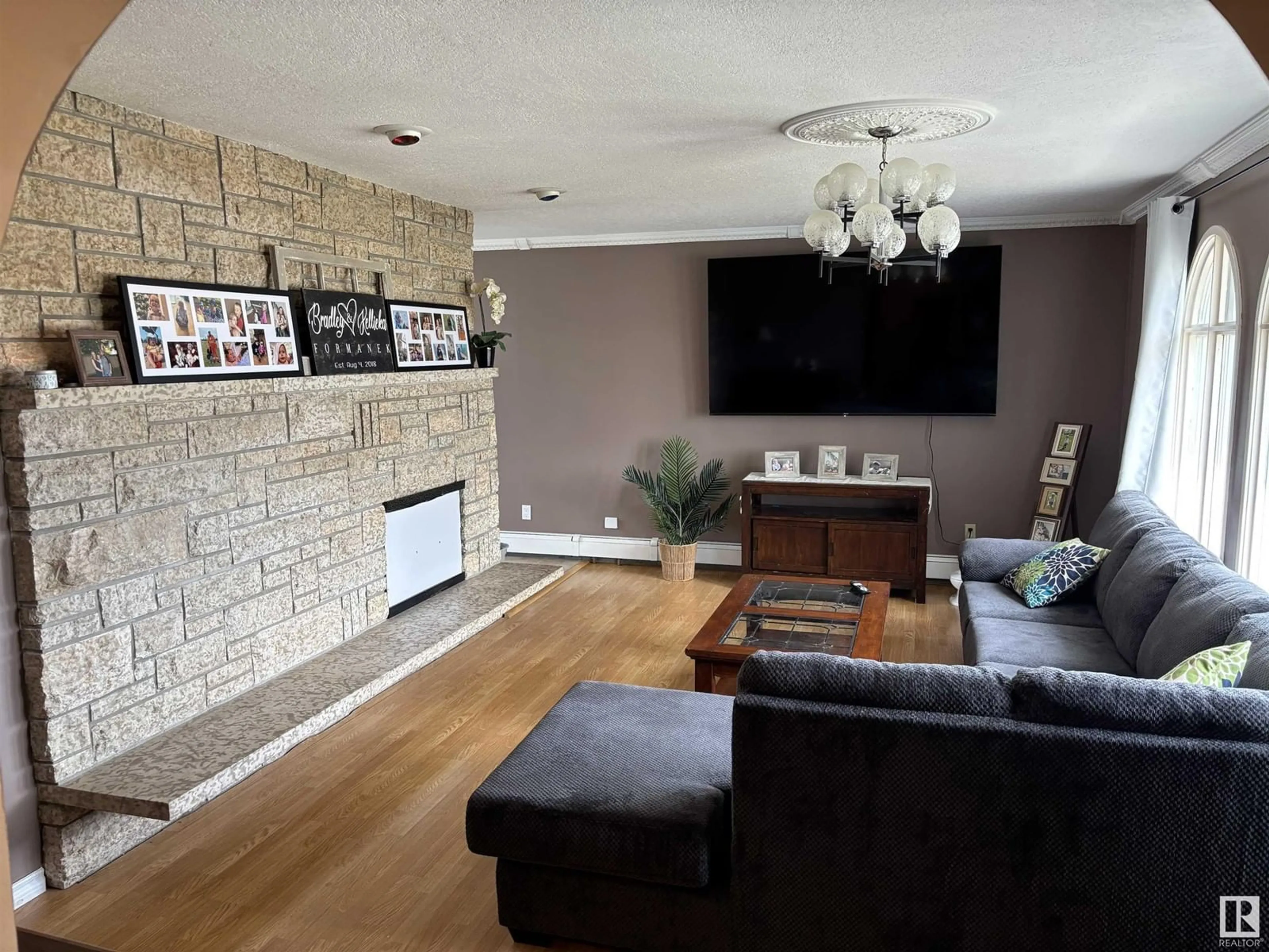Living room with furniture, wood/laminate floor for 5302 56 ST, St. Paul Town Alberta T0A3A1