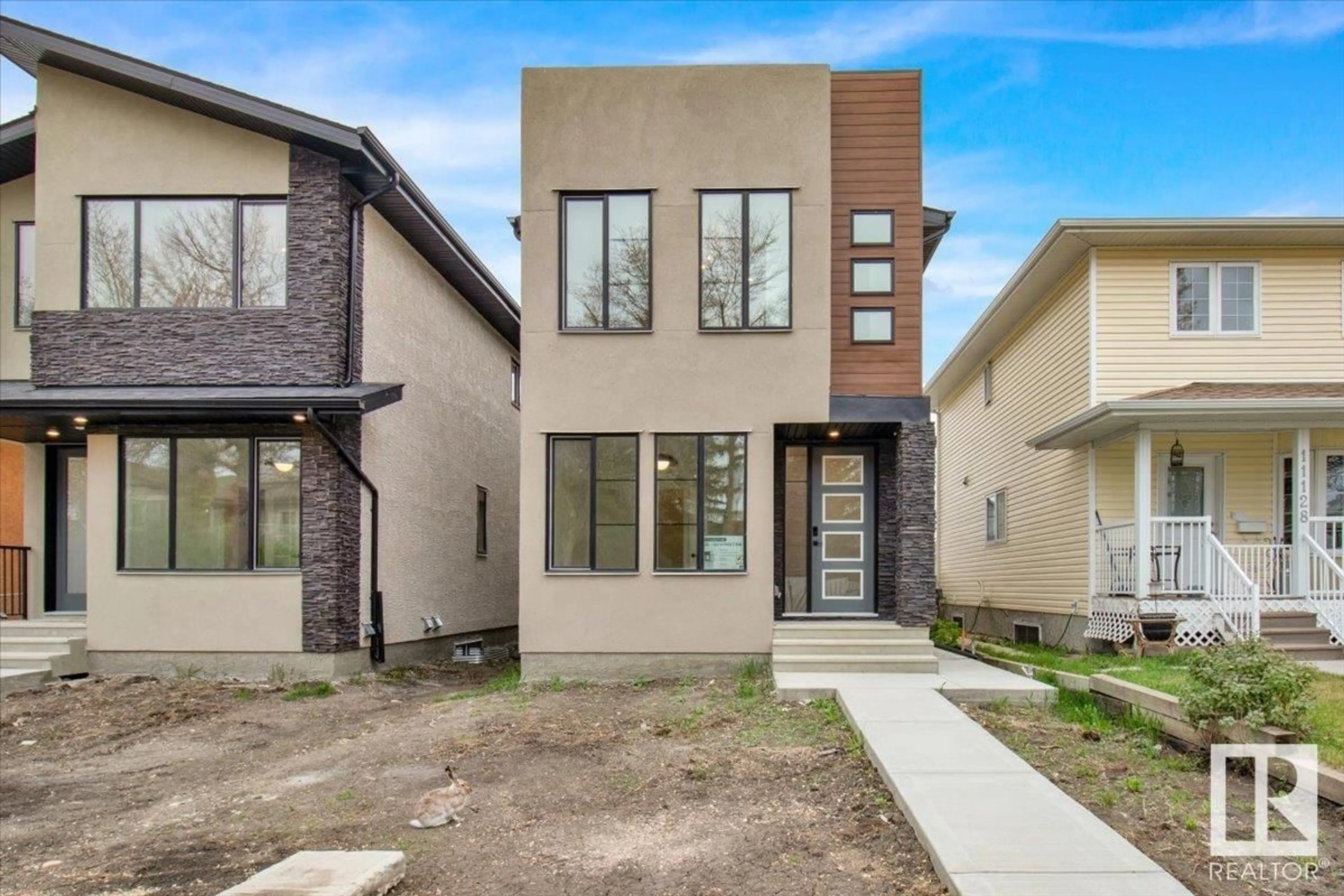Home with brick exterior material, street for NW - 11126 132 ST, Edmonton Alberta T5M1E5