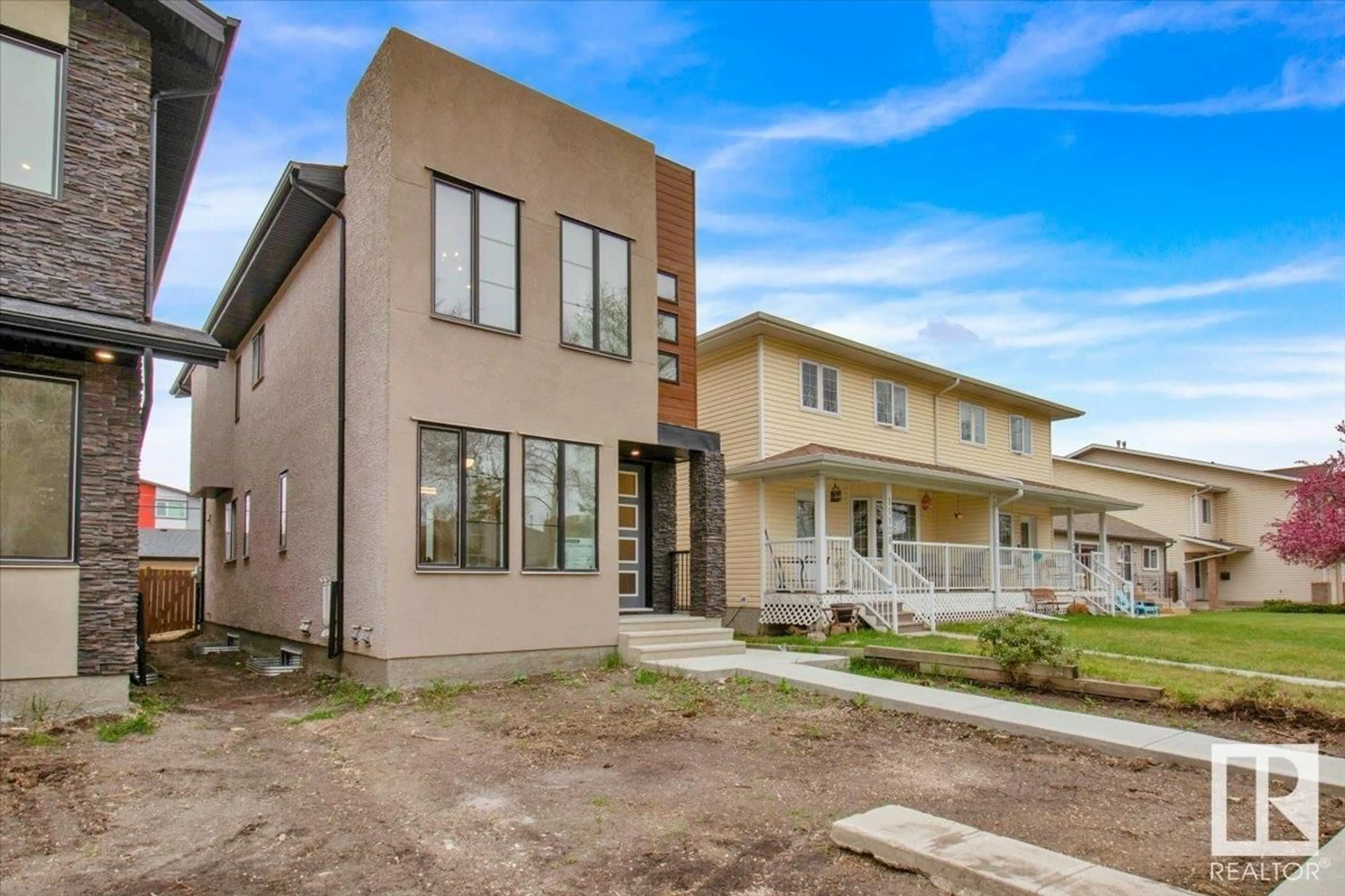 Home with brick exterior material, street for NW - 11126 132 ST, Edmonton Alberta T5M1E5