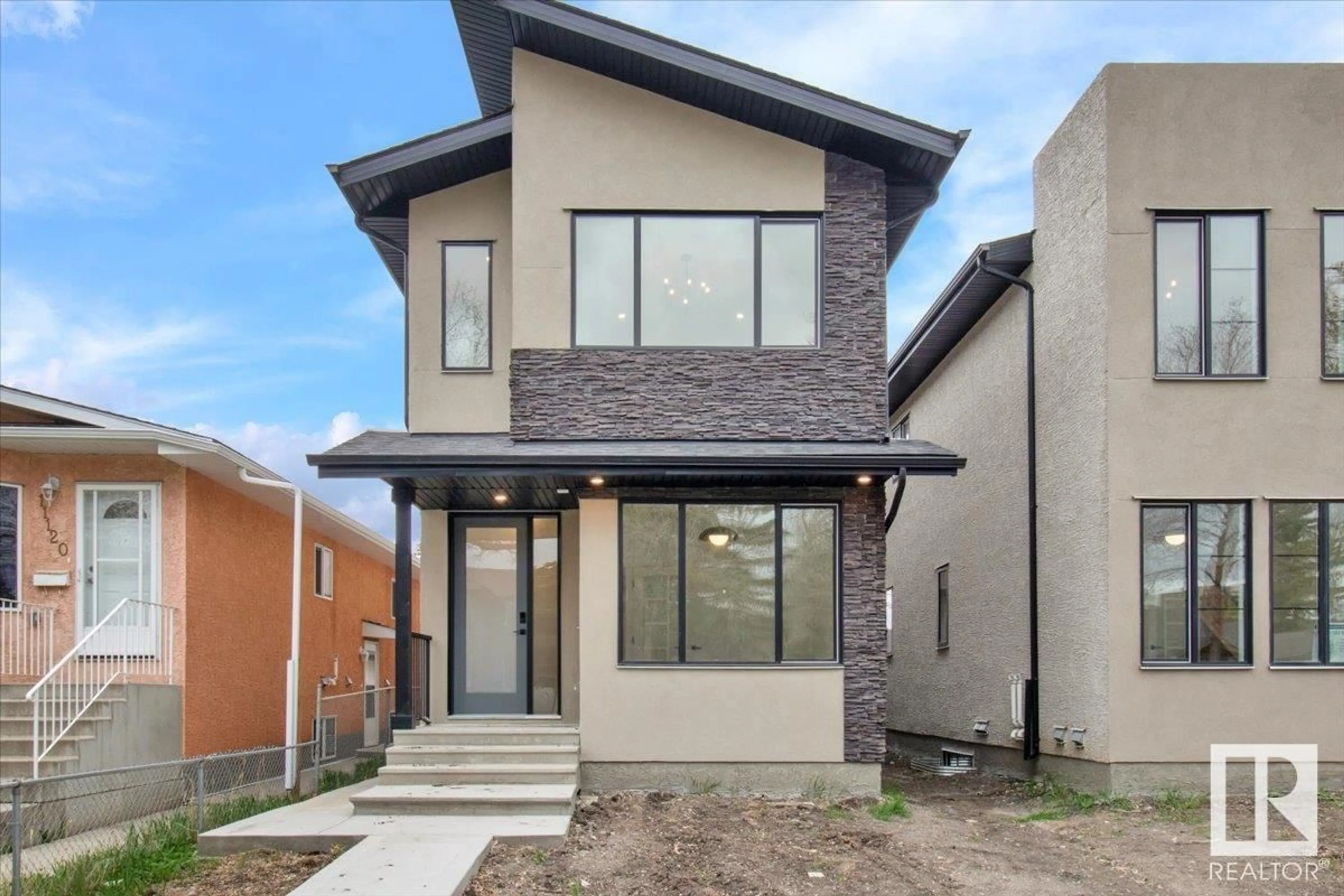 Home with brick exterior material, street for 11124 132 ST, Edmonton Alberta T5M1E5