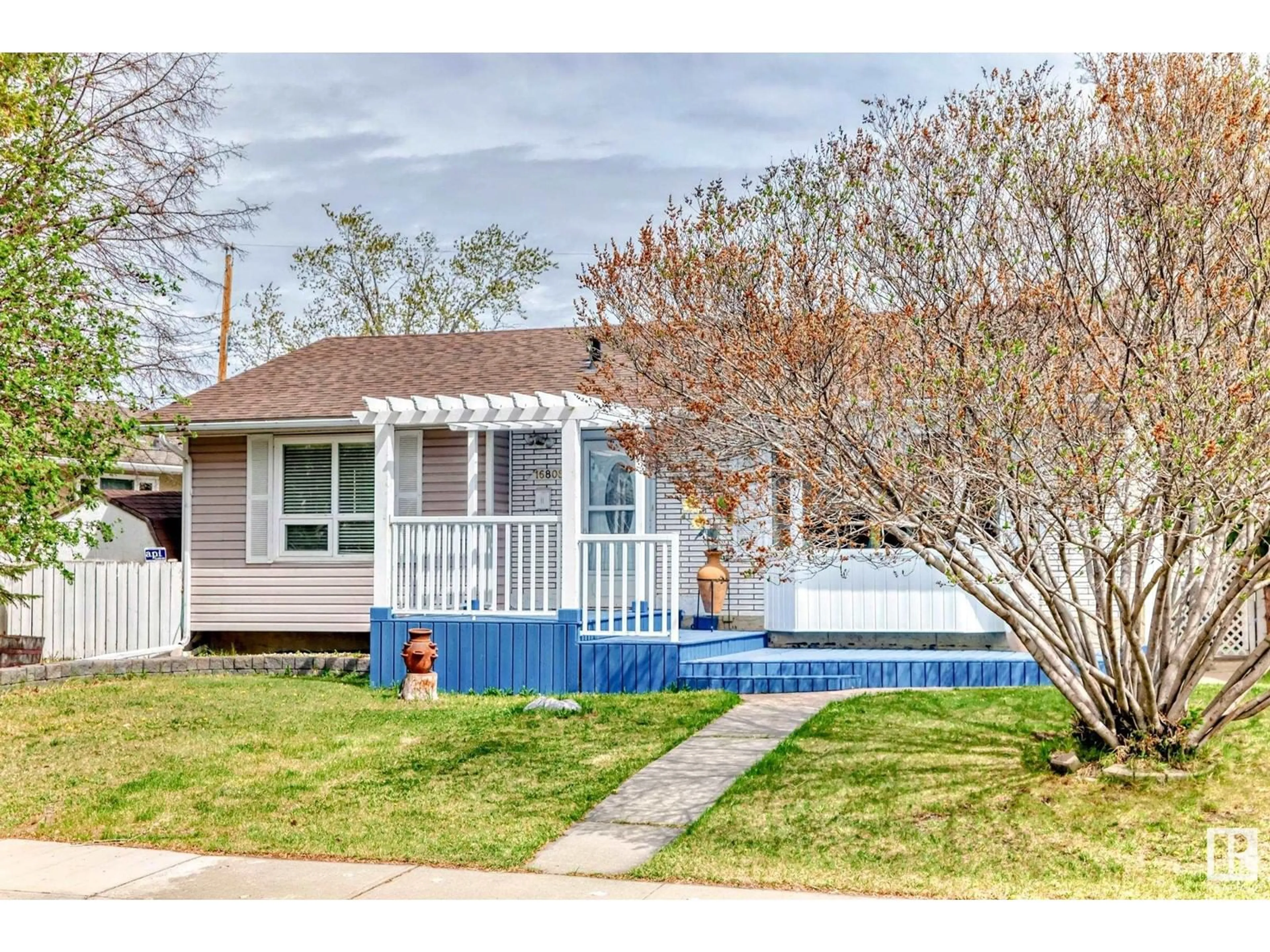 Home with vinyl exterior material, street for 16808 79A AV, Edmonton Alberta T5R3J5