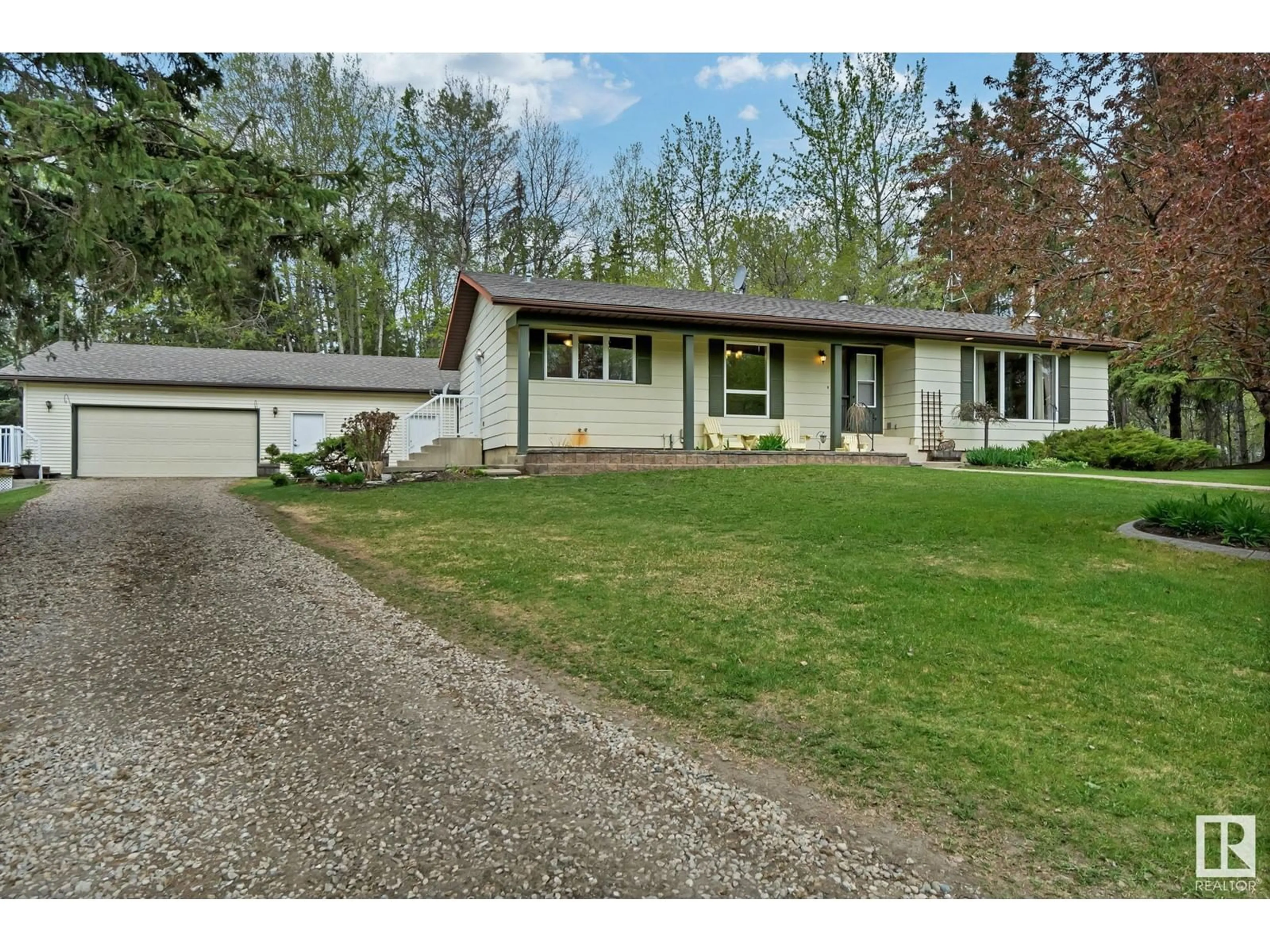 A pic from outside/outdoor area/front of a property/back of a property/a pic from drone, street for A - 3021 TWP ROAD 524, Rural Parkland County Alberta T0E0N0