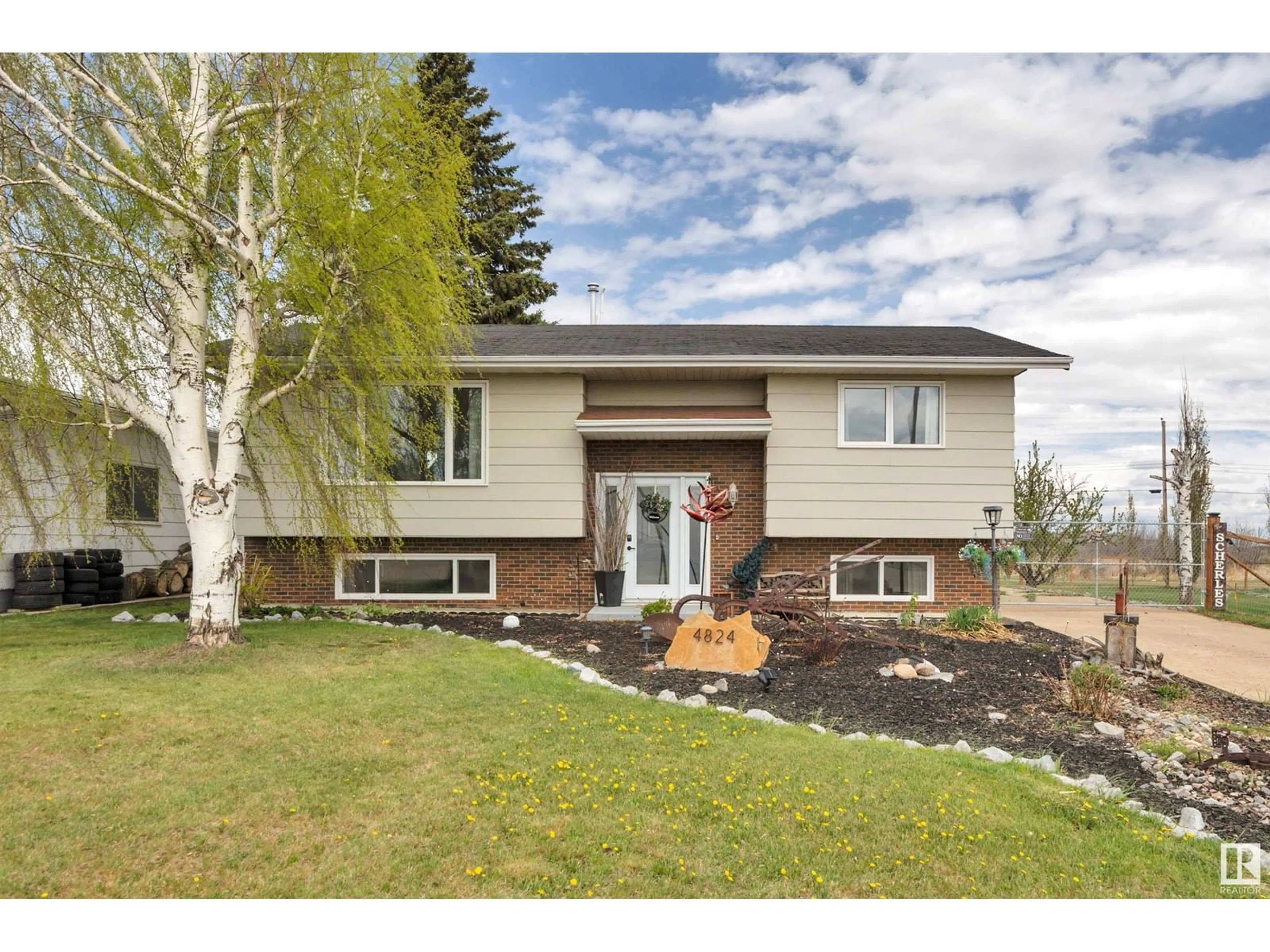 Home with vinyl exterior material, street for 4824 54 AV, Ryley Alberta T0B4A0